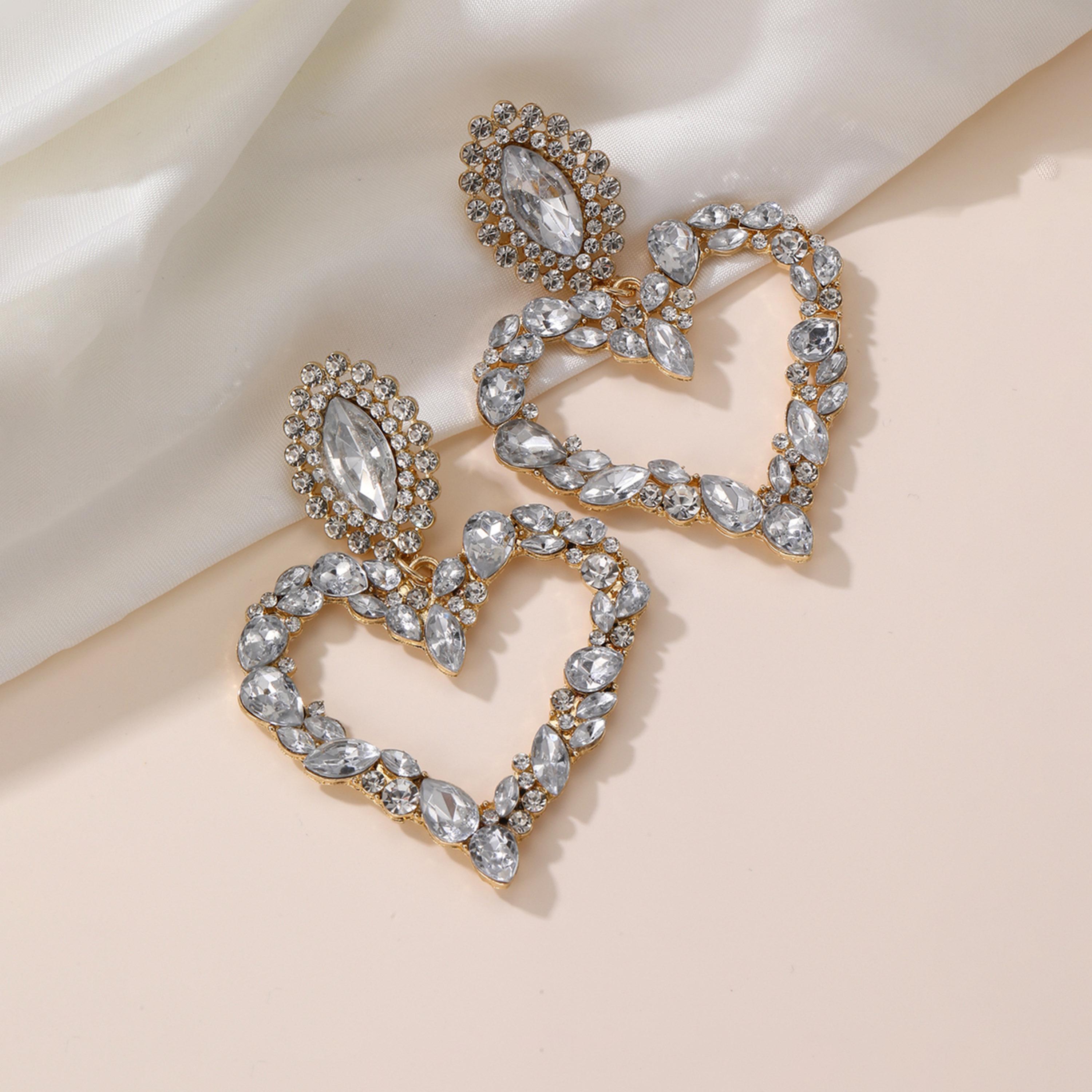 تيك تو - أقراط ذهبية مزينة على شكل قلب-women-watchesandjewellery-jewellery-earrings-image-3