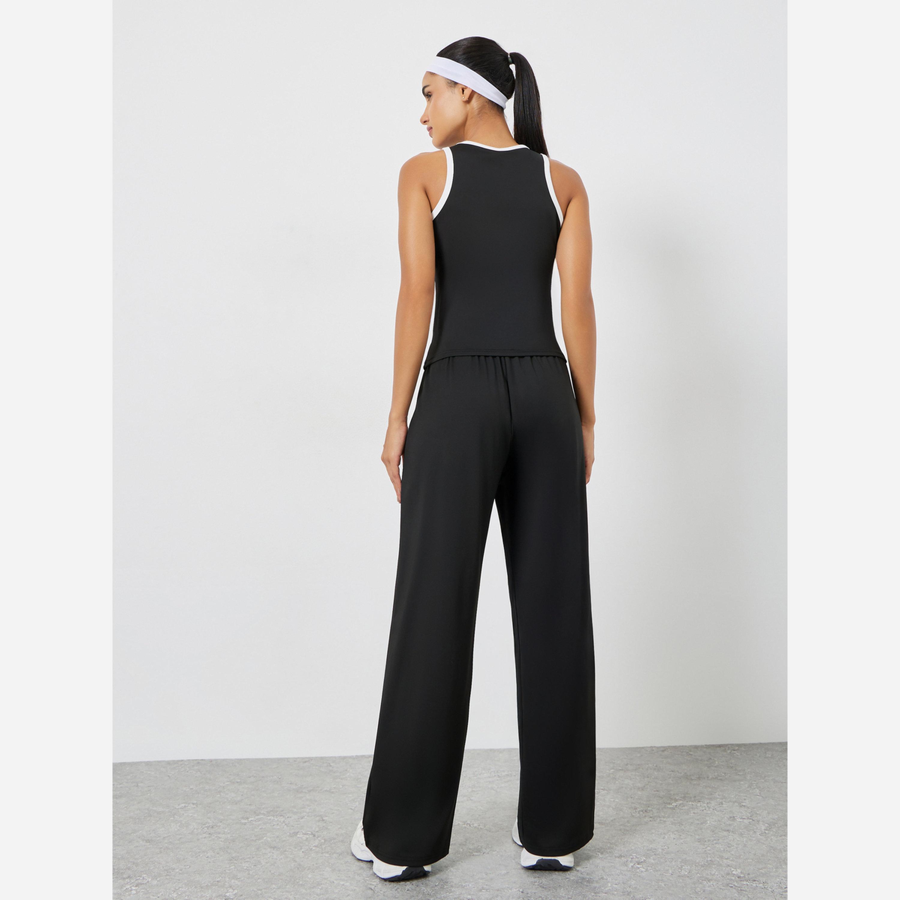 ستايلي - طقم مكون من بلوزة قصيرة بحزام لون مغاير وبنطال مقاس واسع مستقيم-women-clothing-sportswearandactivewear-trackpantsandtracksuits-image-6