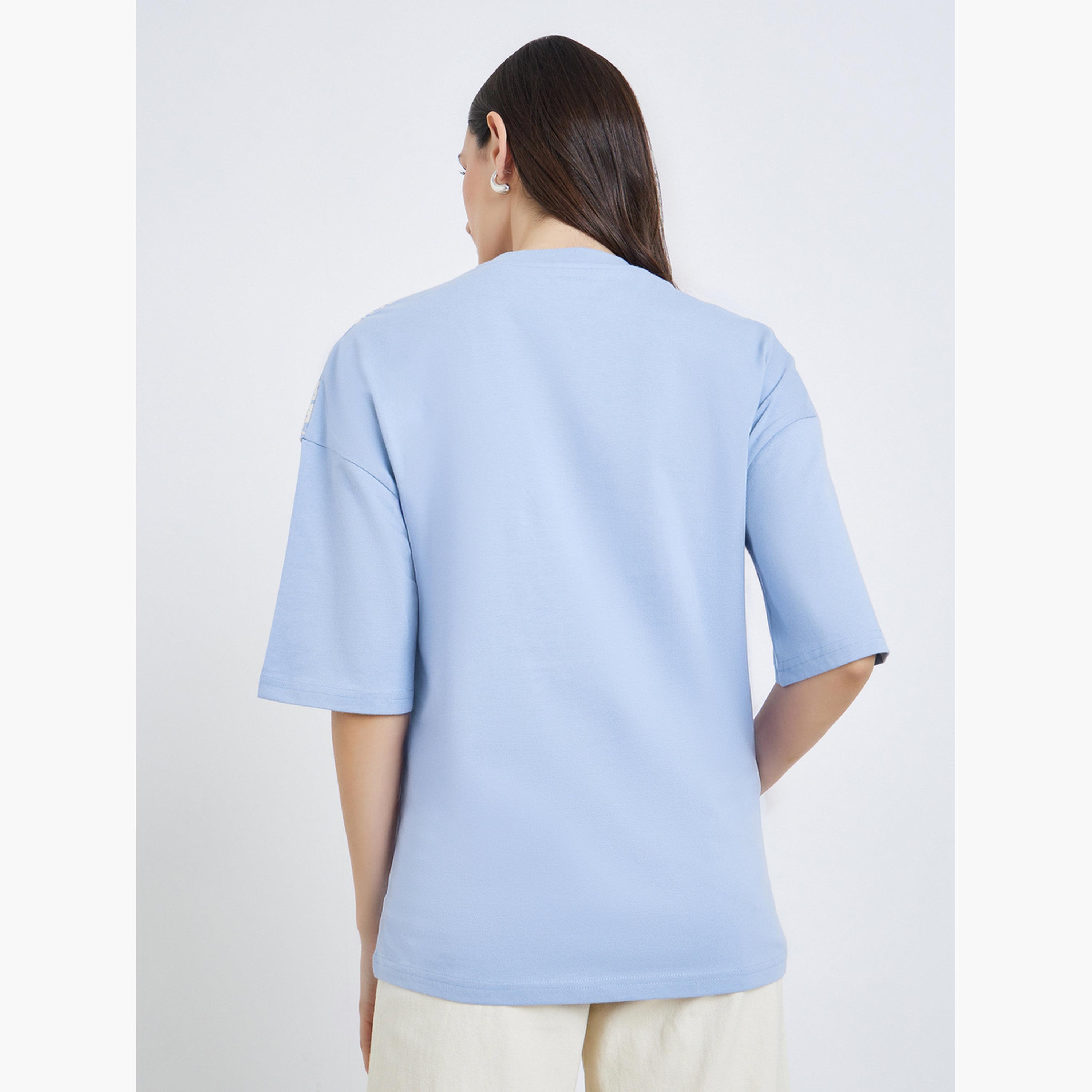 Styli Women Light Blue Placement Flocked Oversized T-Shirt-women-clothing-tshirts-image-4