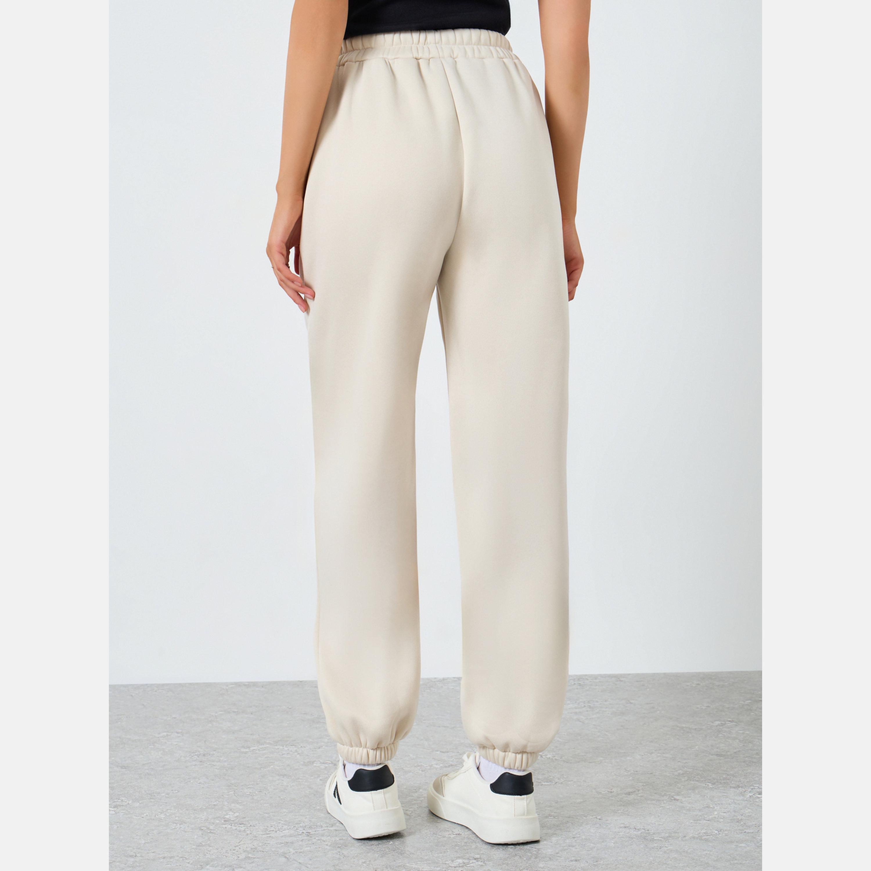 ستايلي - بنطال رياضي بيج سادة بخصر مطاطي وأساور-women-clothing-bottoms-joggers-image-4
