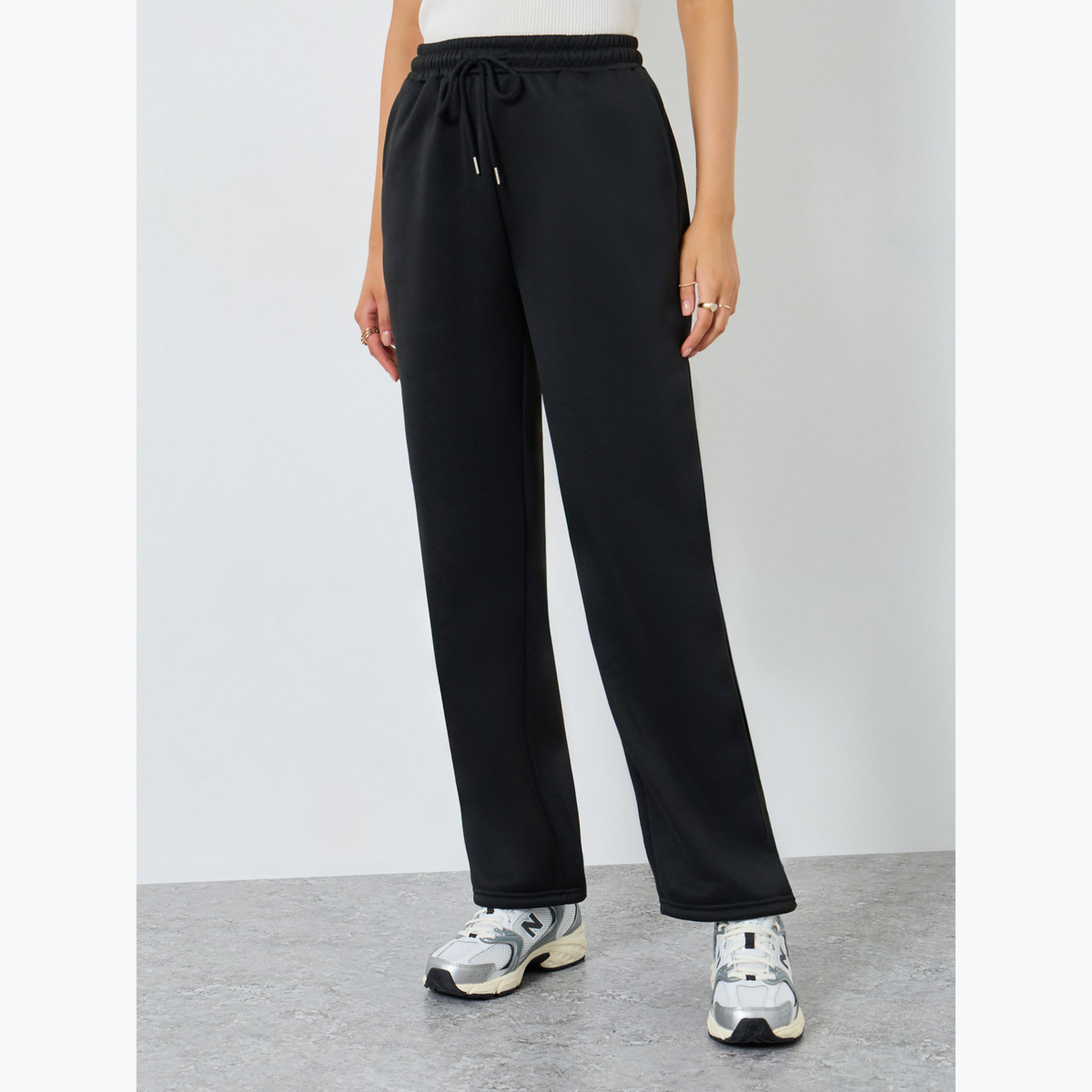 ستايلي - بنطال رياضي أسود سادة واسع الساق-women-clothing-bottoms-joggers-image-1
