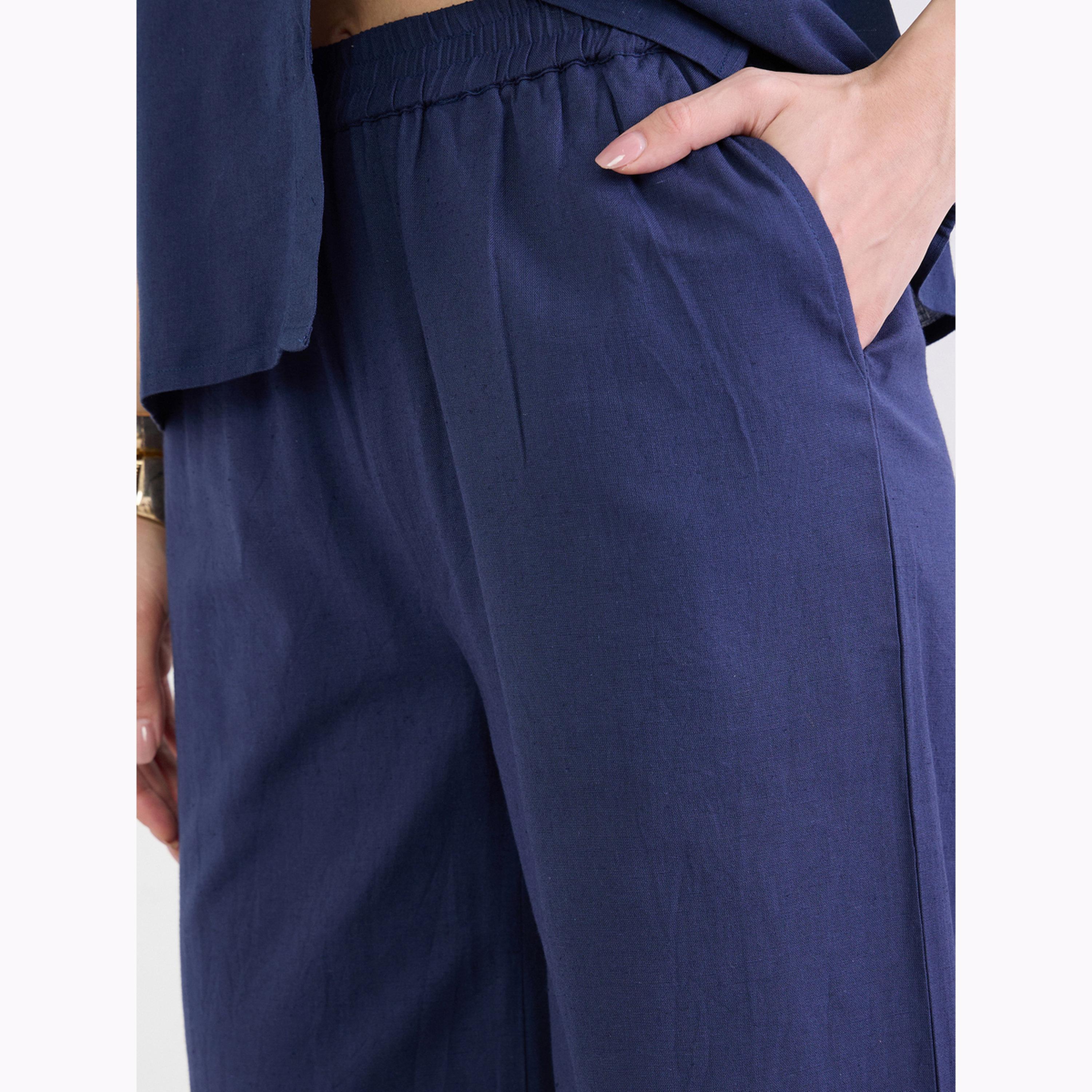 بنطال قطن بأرجل واسعة وتفاصيل شيفلي وخصر مطاطي لون كحلي-women-clothing-bottoms-joggers-image-3