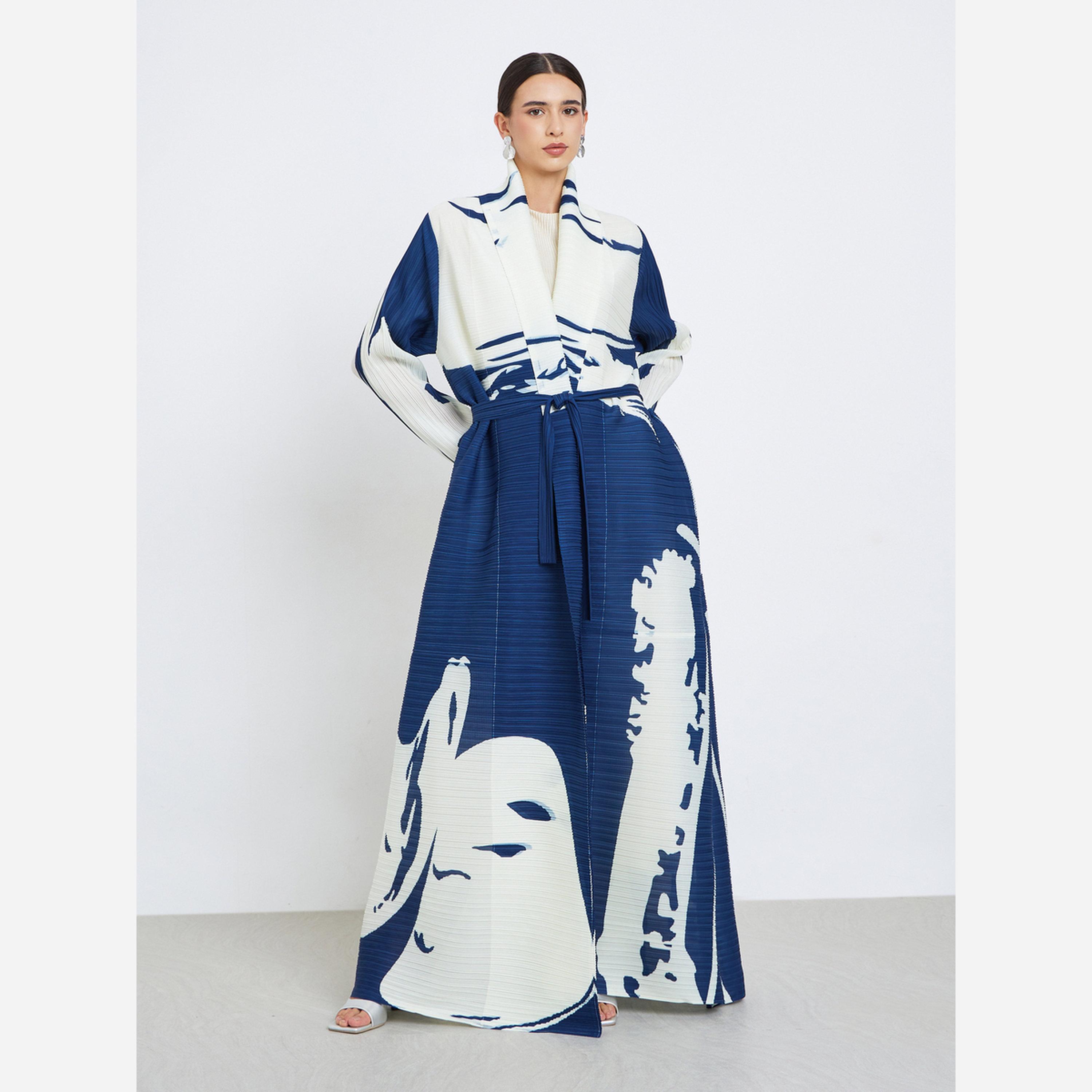 تيك تو - عباية أكمام طويلة طبعة طبعة، ذات ملمس مميز وثنيات.-women-arabicclothing-abayas-image-2