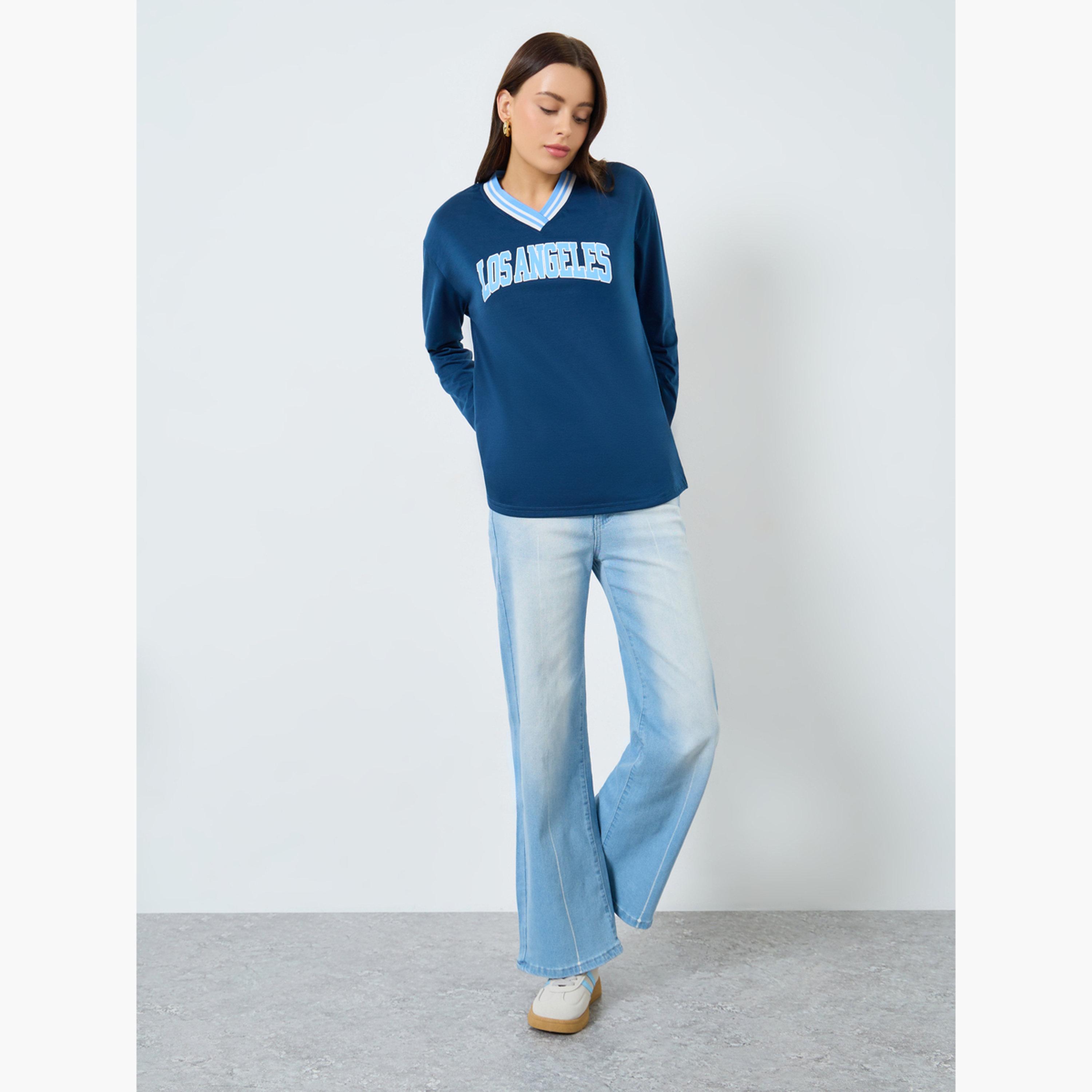 ستايلي - تي شيرت مقاس واسع بطبعة غرافيكية باللون الأزرق الداكن-women-clothing-tshirts-image-4