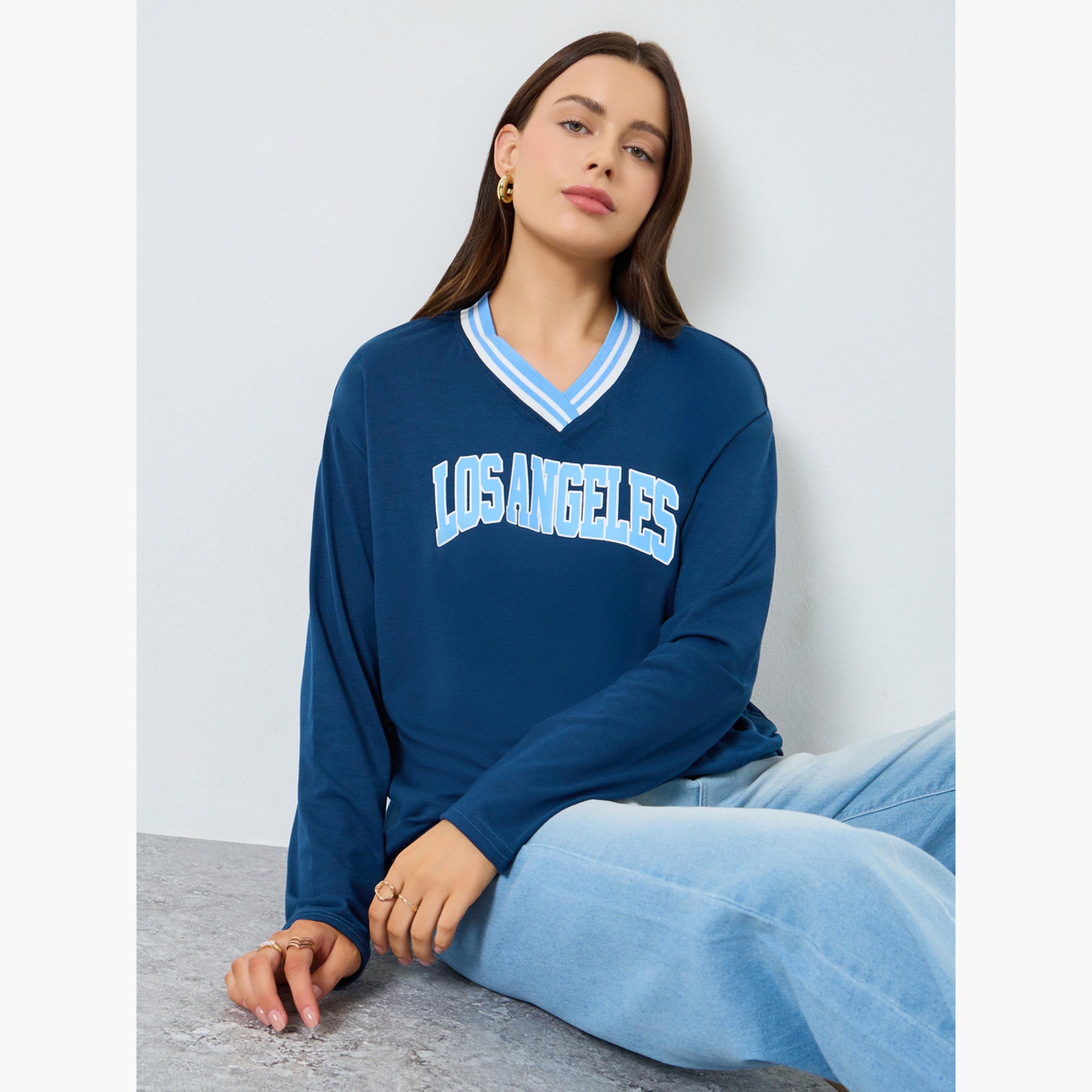 ستايلي - تي شيرت مقاس واسع بطبعة غرافيكية باللون الأزرق الداكن-women-clothing-tshirts-image-3
