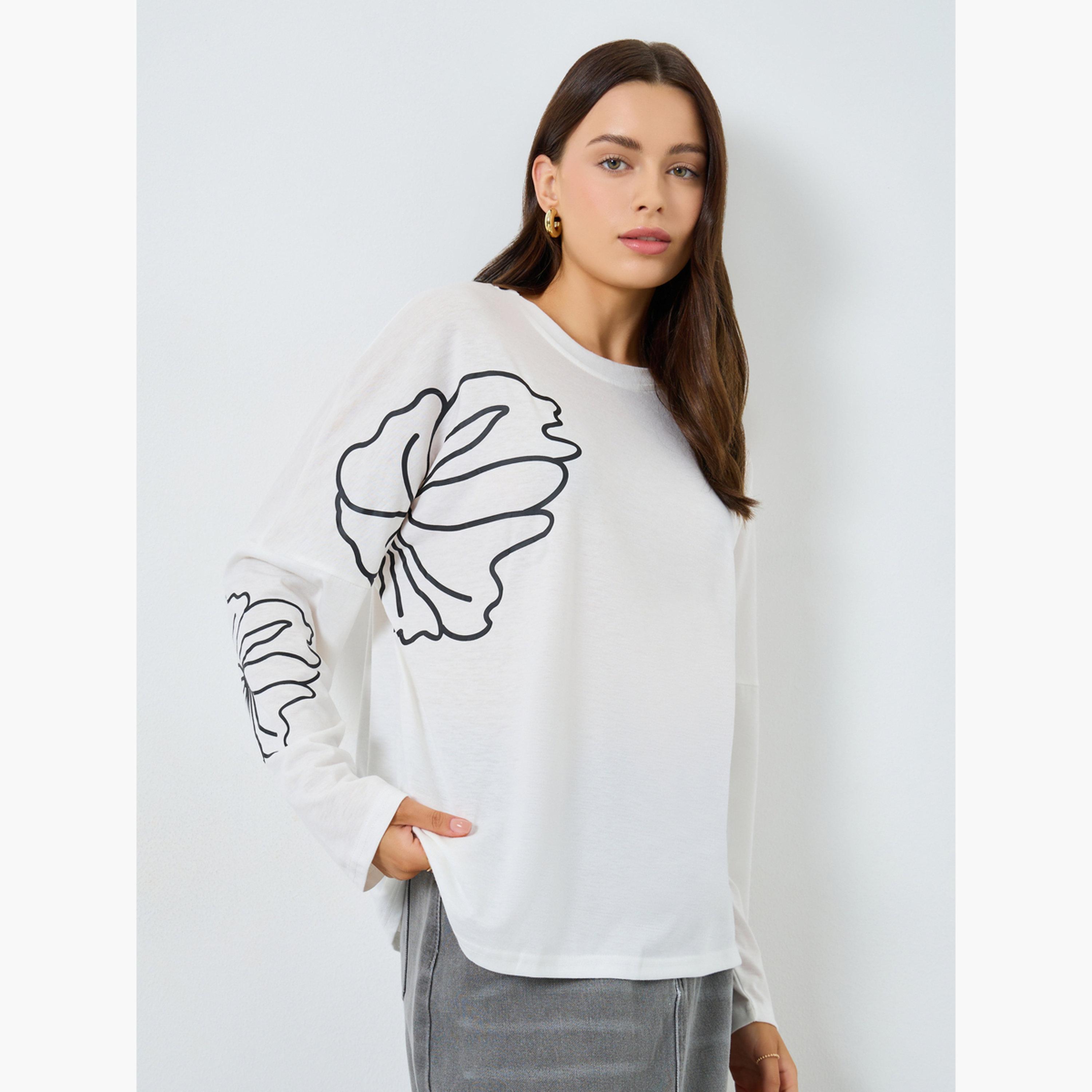 ستايلي - تي شيرت أبيض بأكمام طويلة مزين برسومات زهور-women-clothing-tshirts-image-1