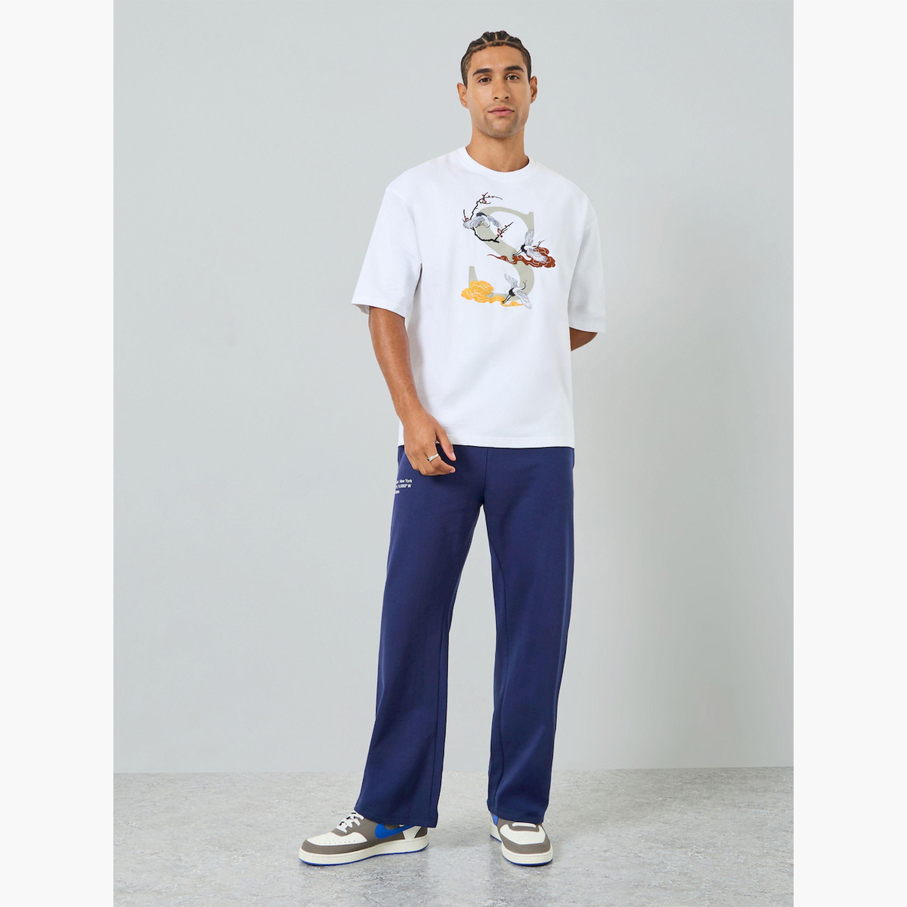 تيشيرت تيري واسع بتفاصيل مُطرّزة-men-clothing-tshirtsandpolos-tshirts-image-2