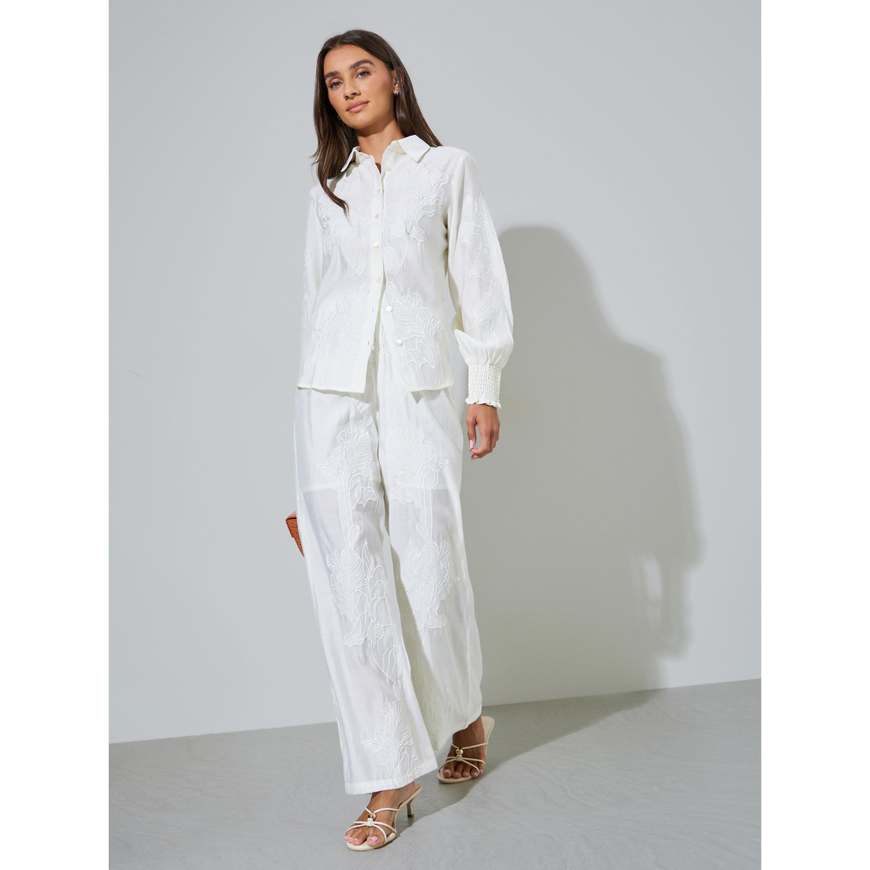بنطال شفاف بأرجل واسعة ومرصع بلون أوف وايت-women-clothing-joggers-image-2