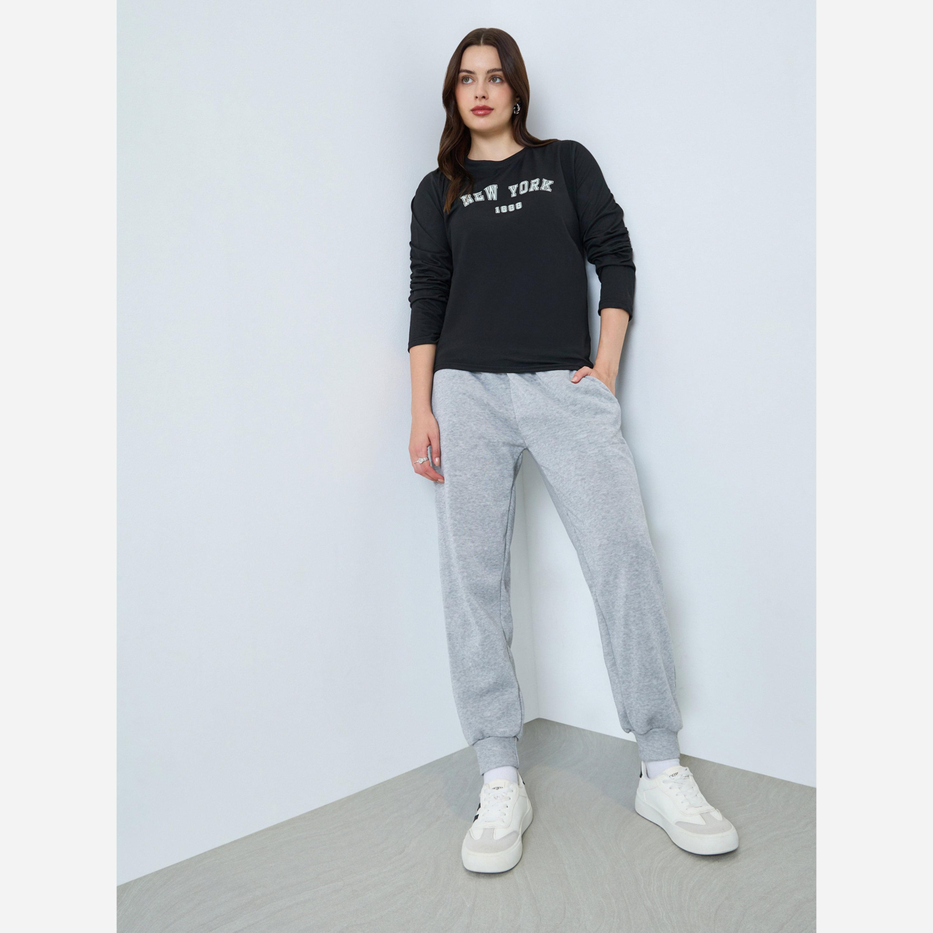 ستايلي - بنطال رياضي واسع الساقين ذو أطراف مطوية لون سادة-women-clothing-bottoms-joggers-image-3