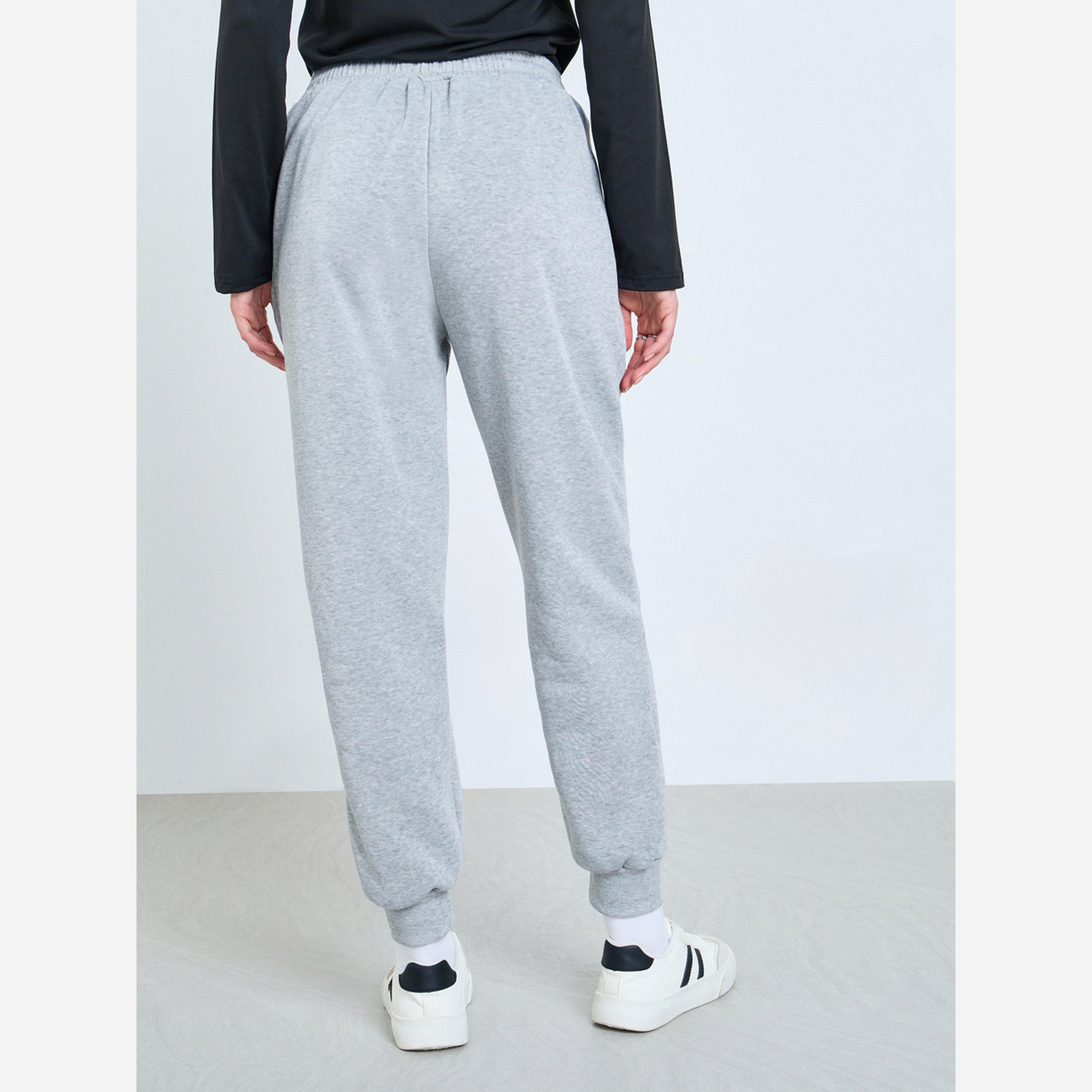 ستايلي - بنطال رياضي واسع الساقين ذو أطراف مطوية لون سادة-women-clothing-bottoms-joggers-image-1