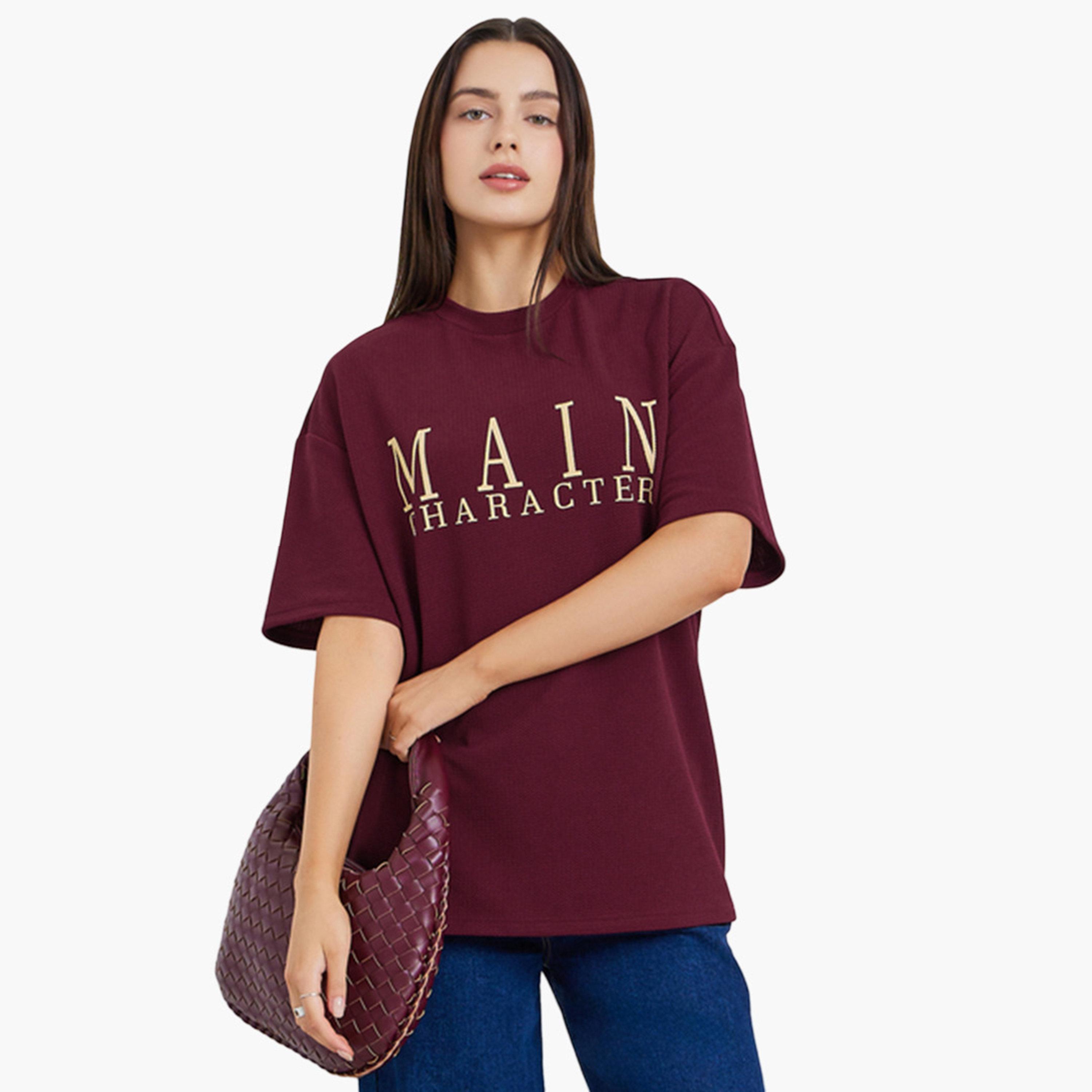 تيشيرت واسع بطبعة شعار-women-clothing-tshirts-image-1