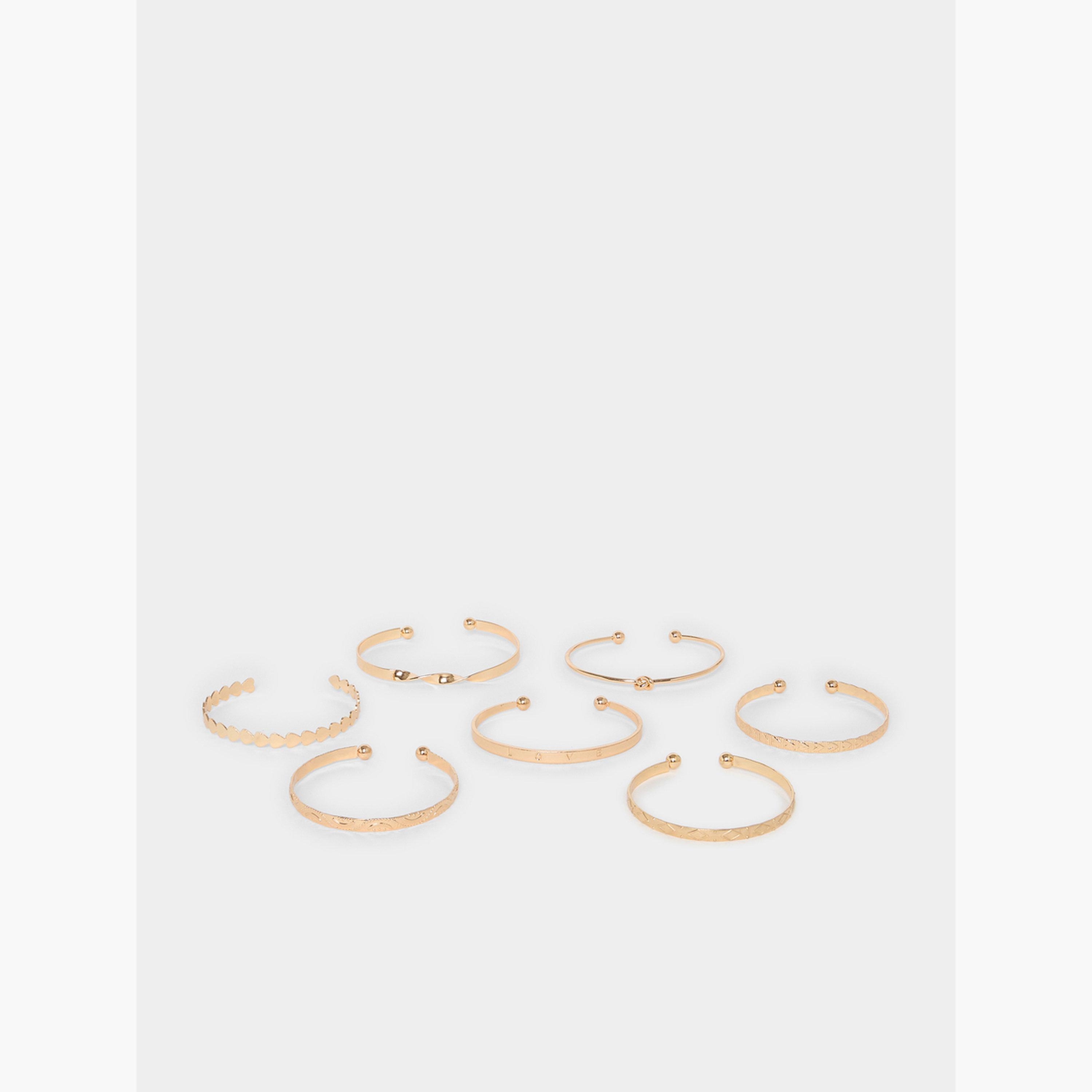 طقم مكون من 7 أساور بانغل ذهبية-women-watchesandjewellery-jewellery-banglesandbracelets-image-1