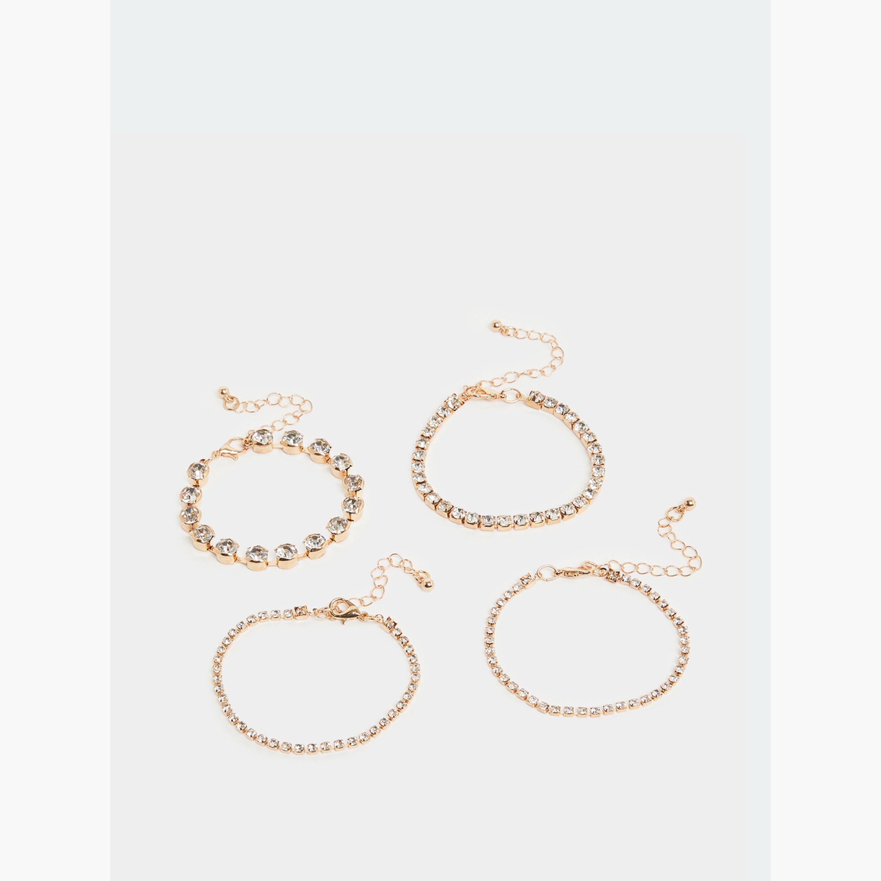 طقم 4 أساور مزينة باللون الذهبي-women-watchesandjewellery-jewellery-banglesandbracelets-image-1