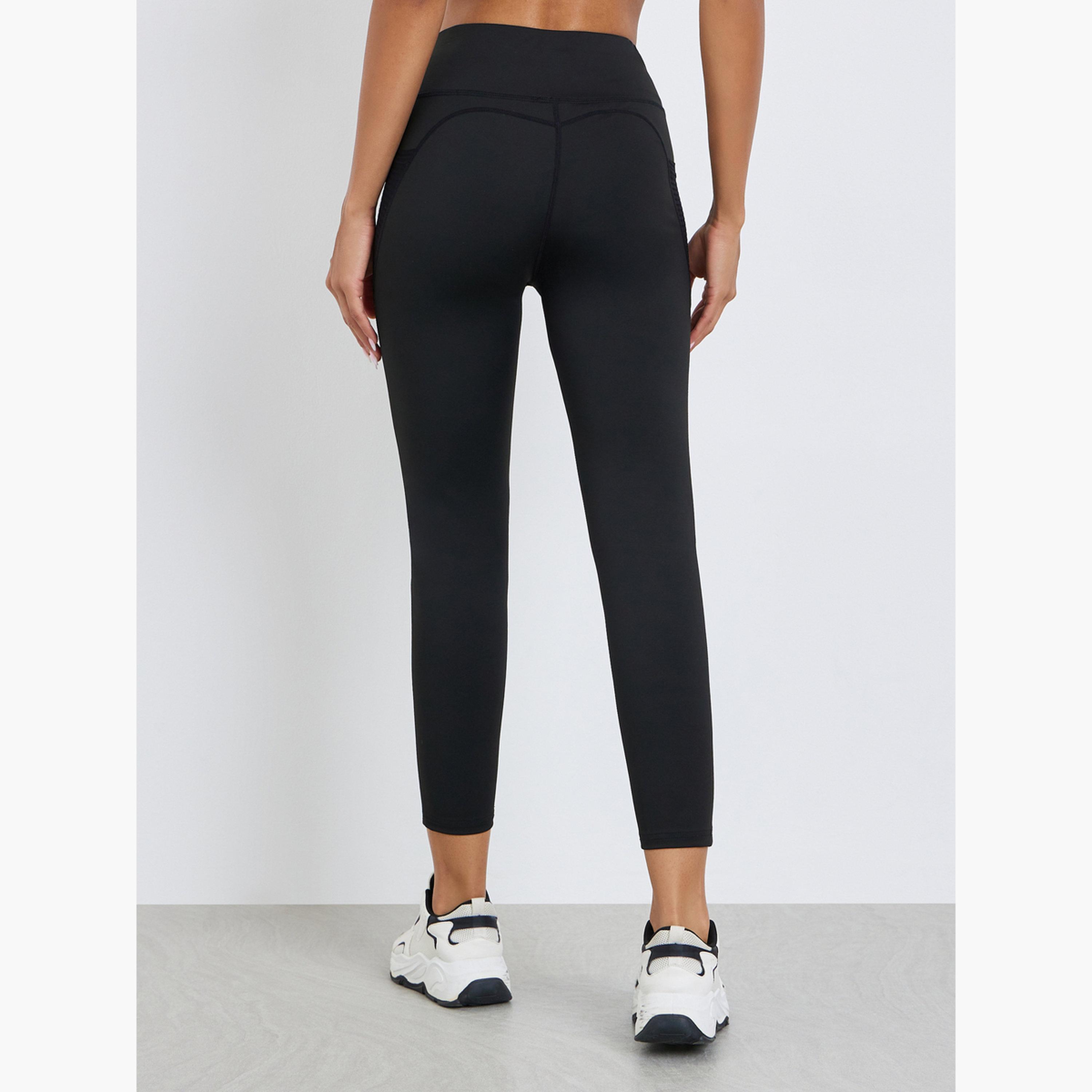 ليقنز بتفاصيل بارزة الملمس بطول 7/8 وأشرطة عاكسة-sports-women-clothing-joggersandtrackpants-image-4