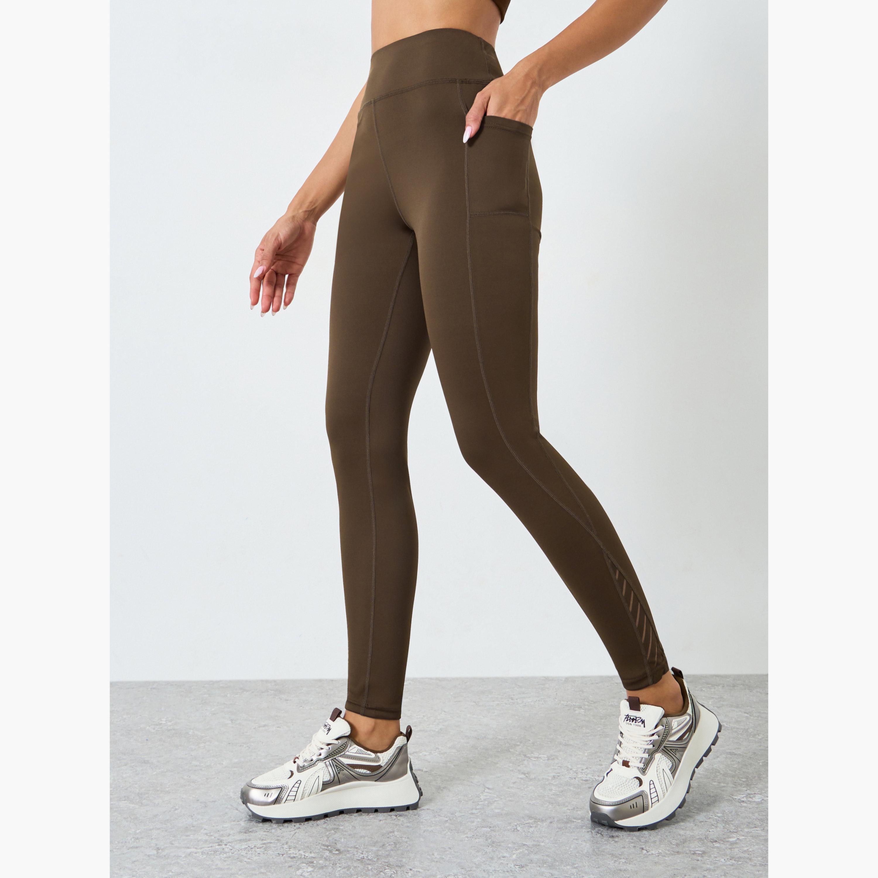 ليقنز بأجزاء شبكية عند الخصر من الخلف وتفاصيل بارزة الملمس-women-clothing-bottoms-leggings-image-1