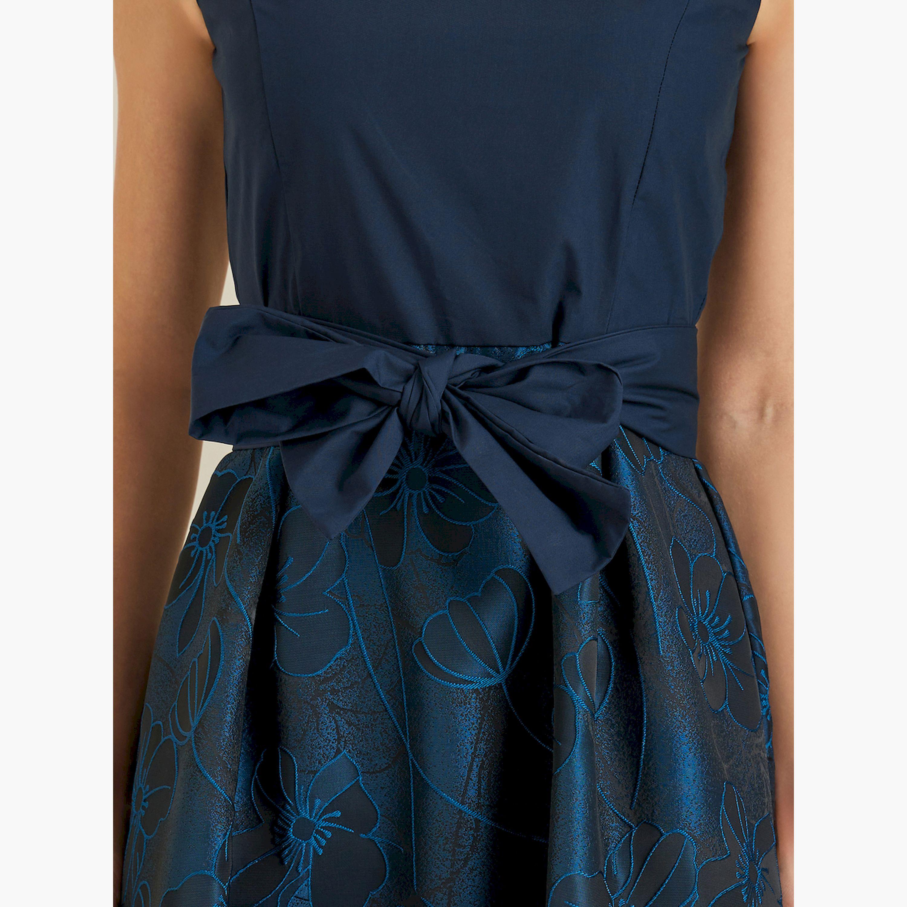 فستان طويل بدون أكمام بطبعة زهور وتفاصيل فيونكة-women-clothing-dresses-image-5