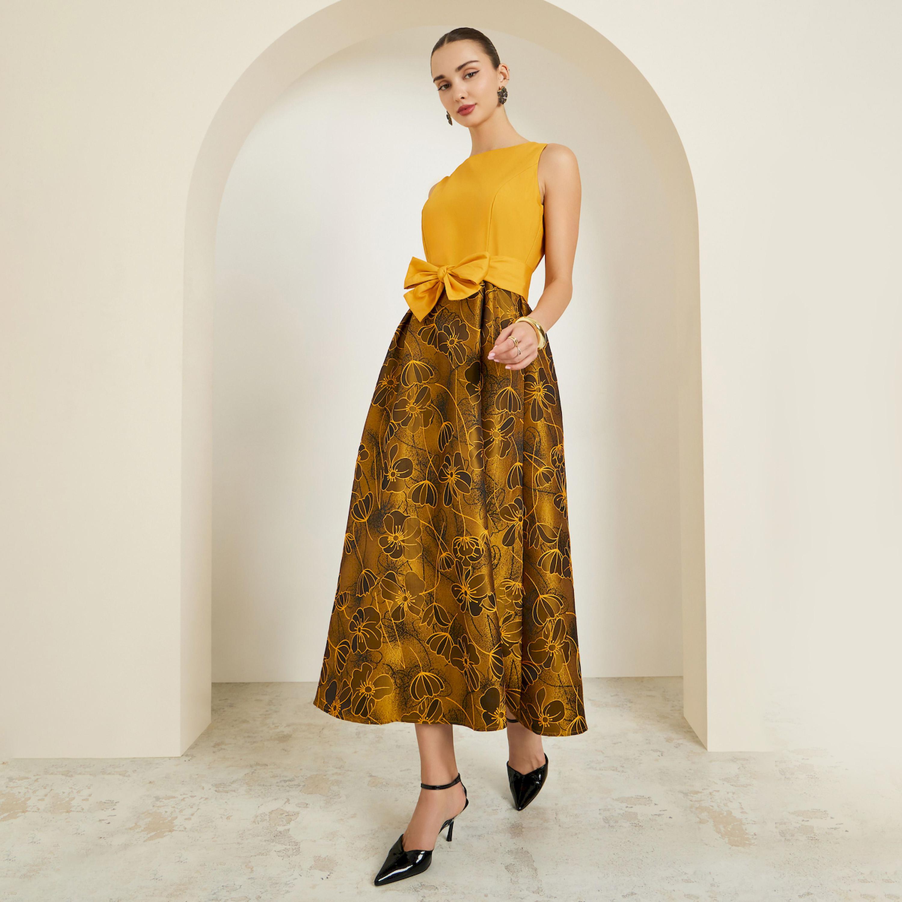 فستان طويل بدون أكمام بطبعة زهور وتفاصيل فيونكة-women-clothing-dresses-image-1