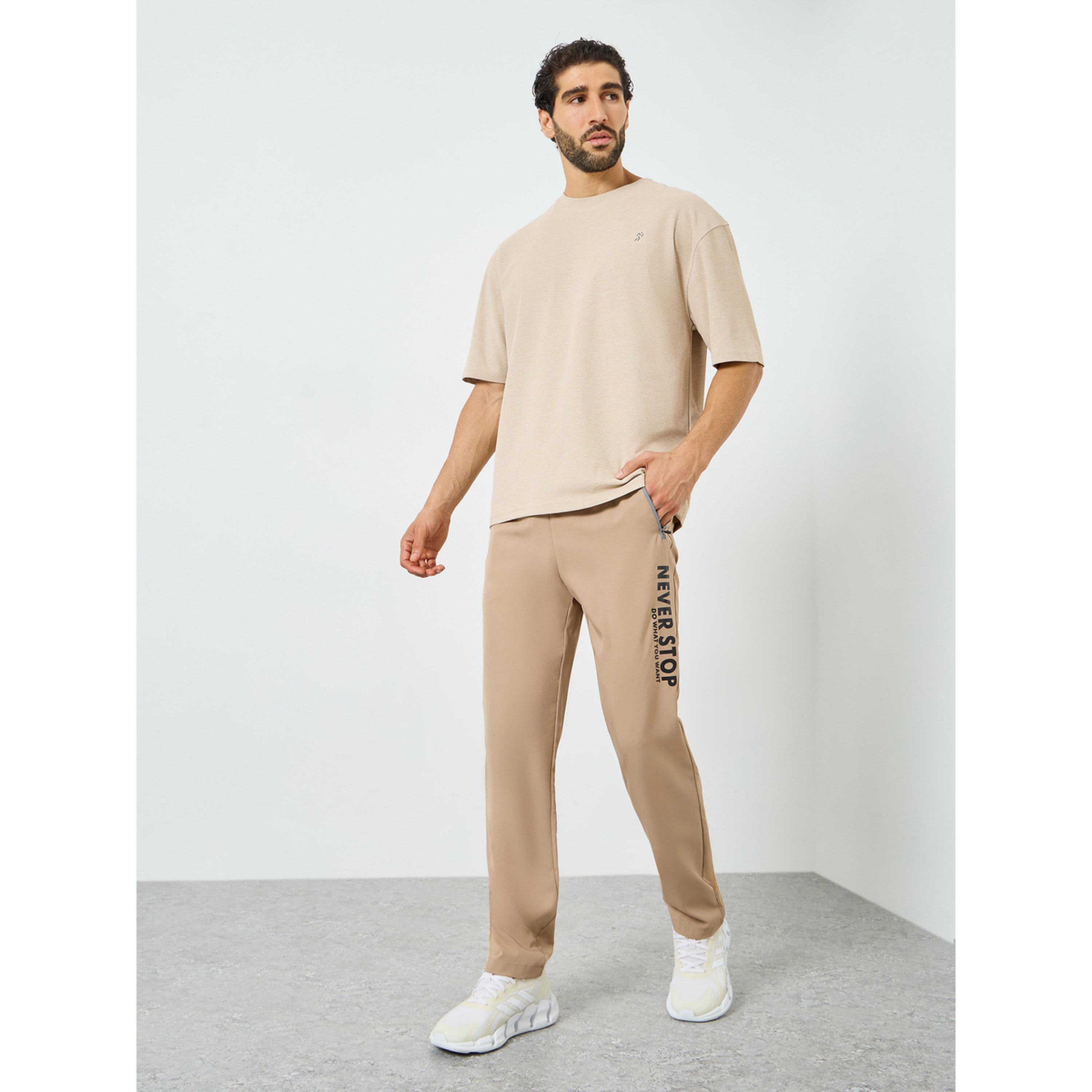 Styli Men Beige Graphic Training Track Pants-men-clothing-sportswearandactivewear-bottoms-joggers-image-2