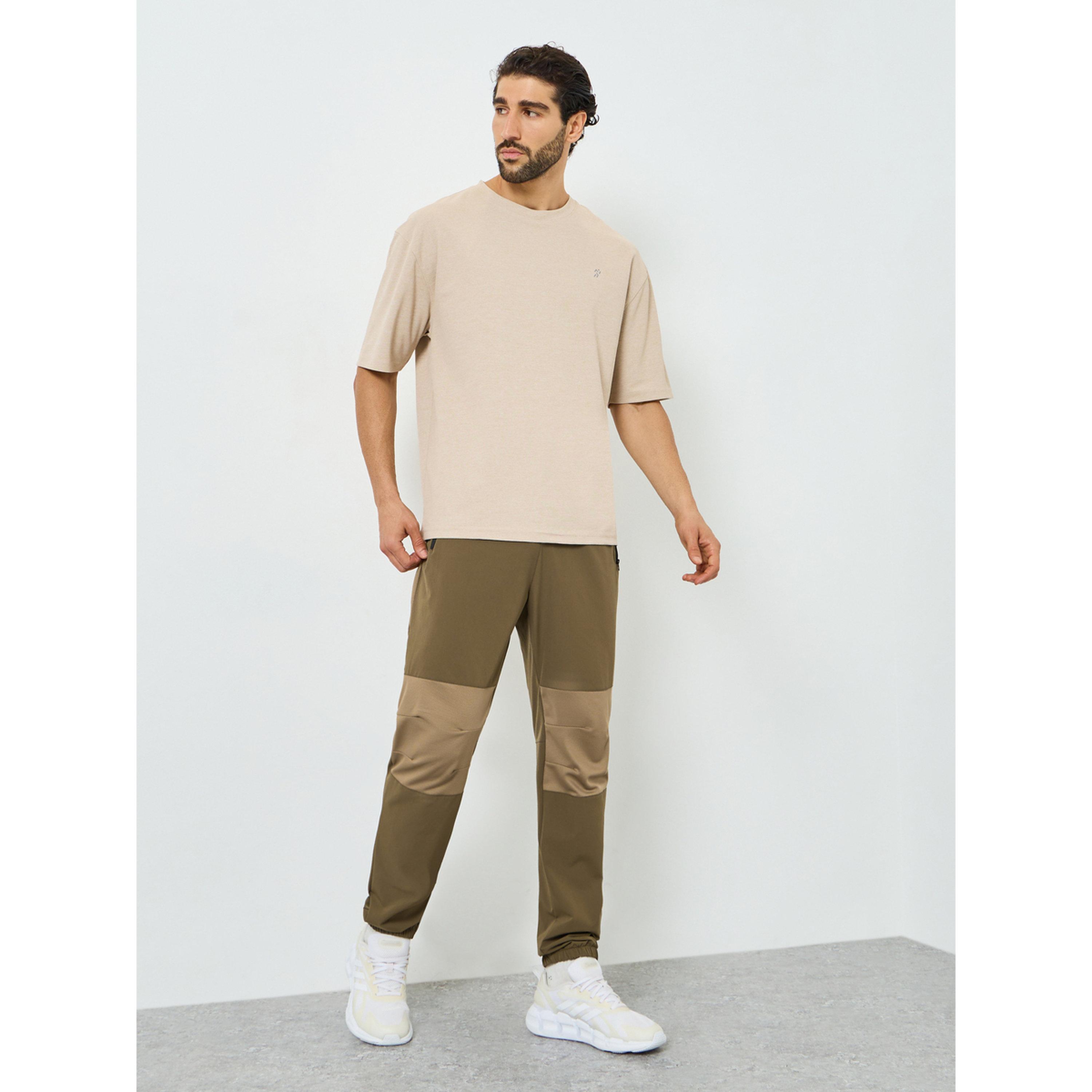 بنطال رياضي رجالي بنمط كتل الالوان-men-clothing-sportswearandactivewear-bottoms-joggers-image-2