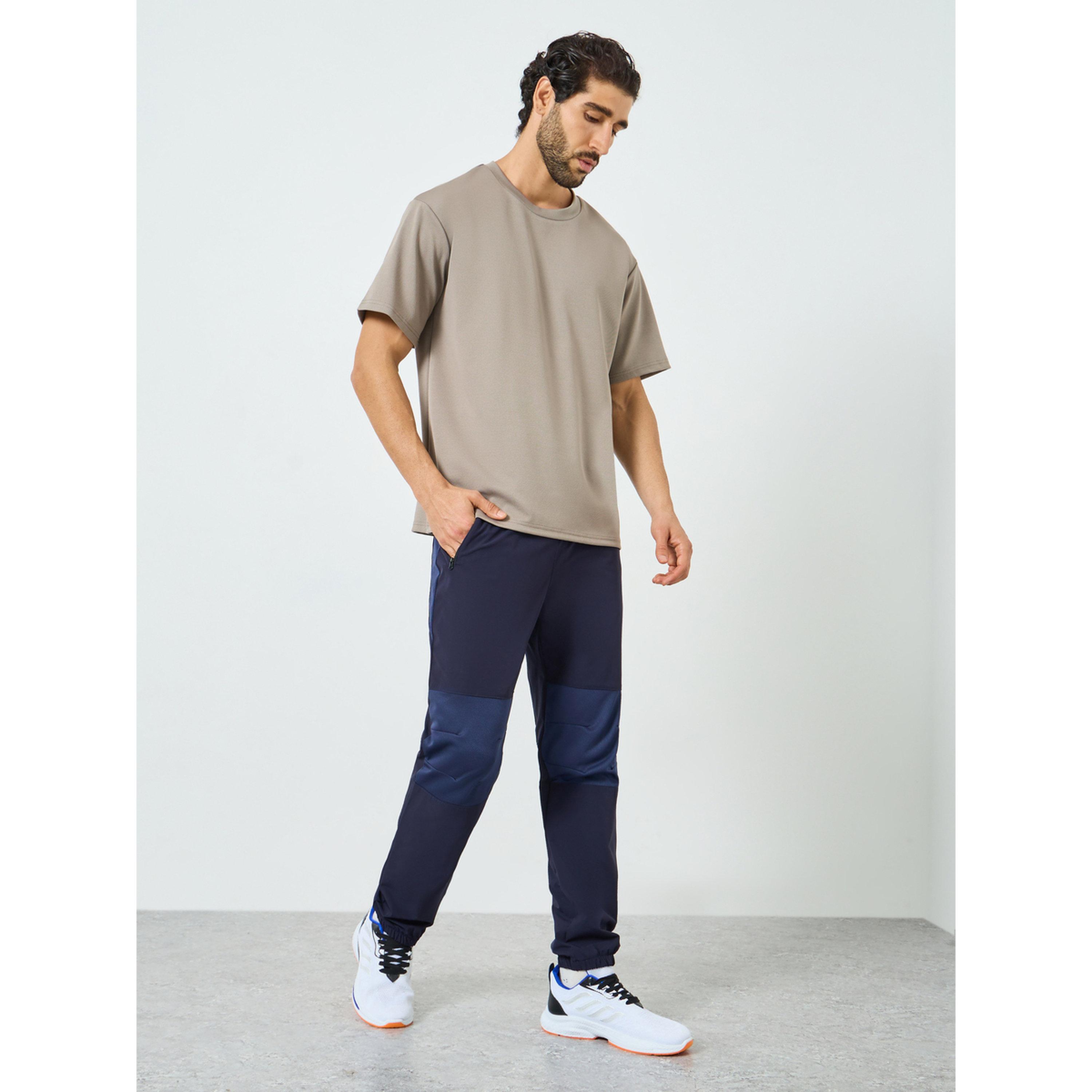 بنطال رياضي رجالي كحلي بنمط كتل الالوان-men-clothing-sportswearandactivewear-bottoms-joggers-image-2