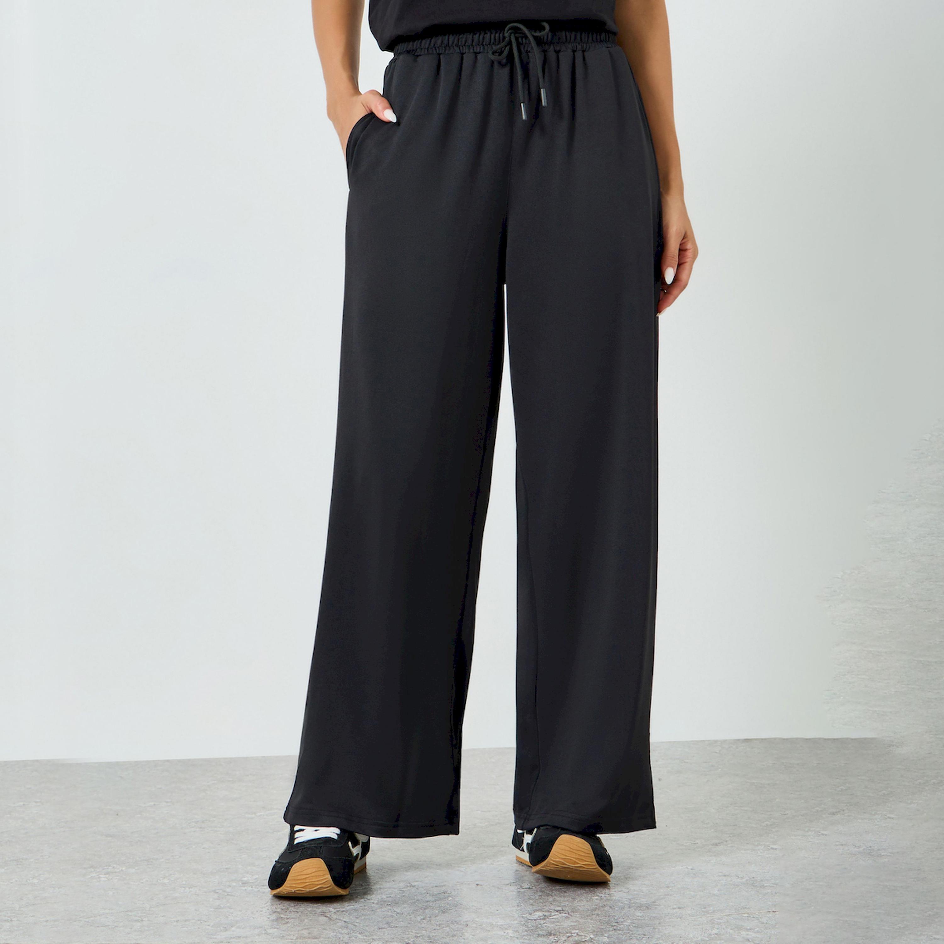 جوغر أسود ساق واسعة برباط-women-clothing-bottoms-joggers-image-1