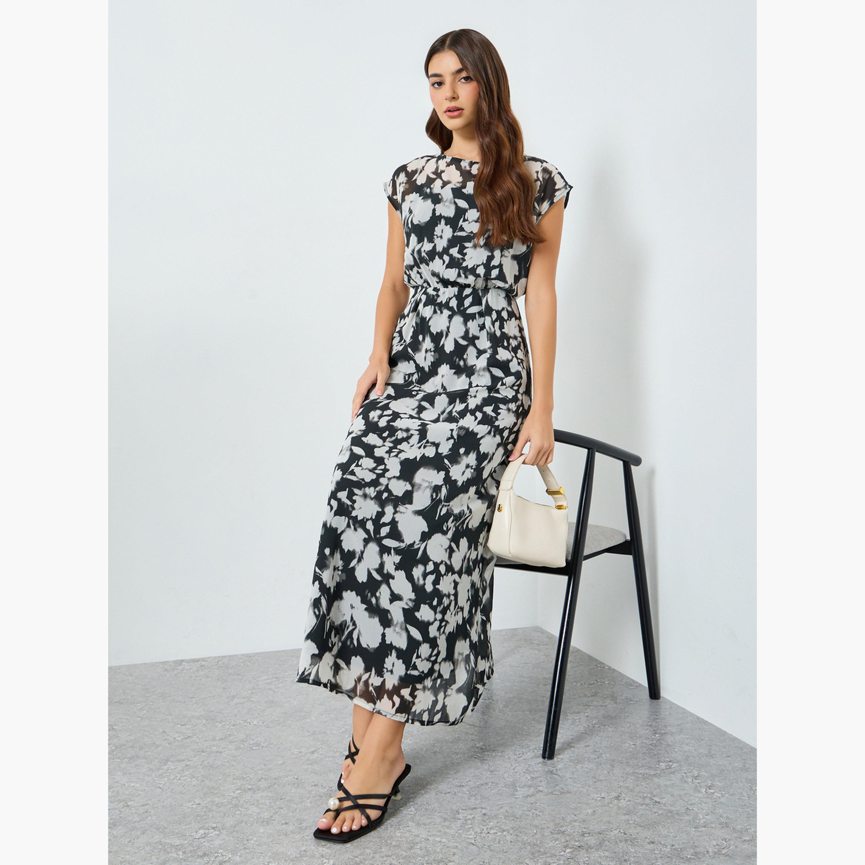 فستان طويل بحافة واسعة بلا أكمام وطبعة أزهار-women-clothing-dresses-image-2