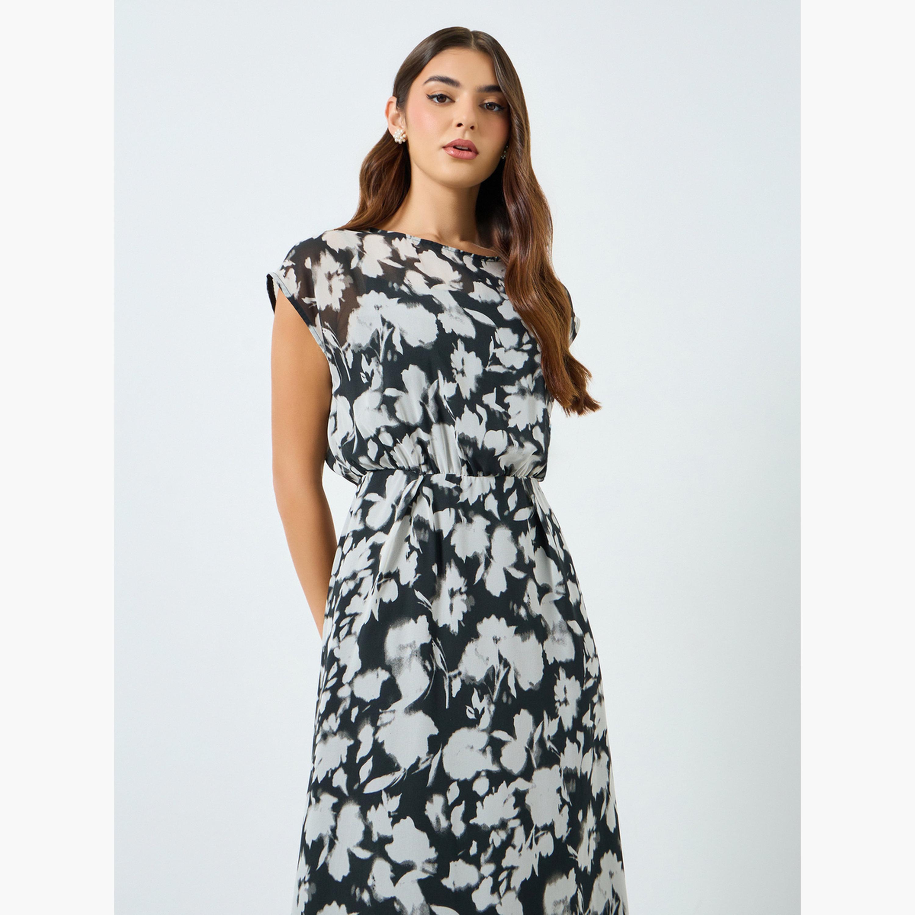 فستان طويل بحافة واسعة بلا أكمام وطبعة أزهار-women-clothing-dresses-image-3