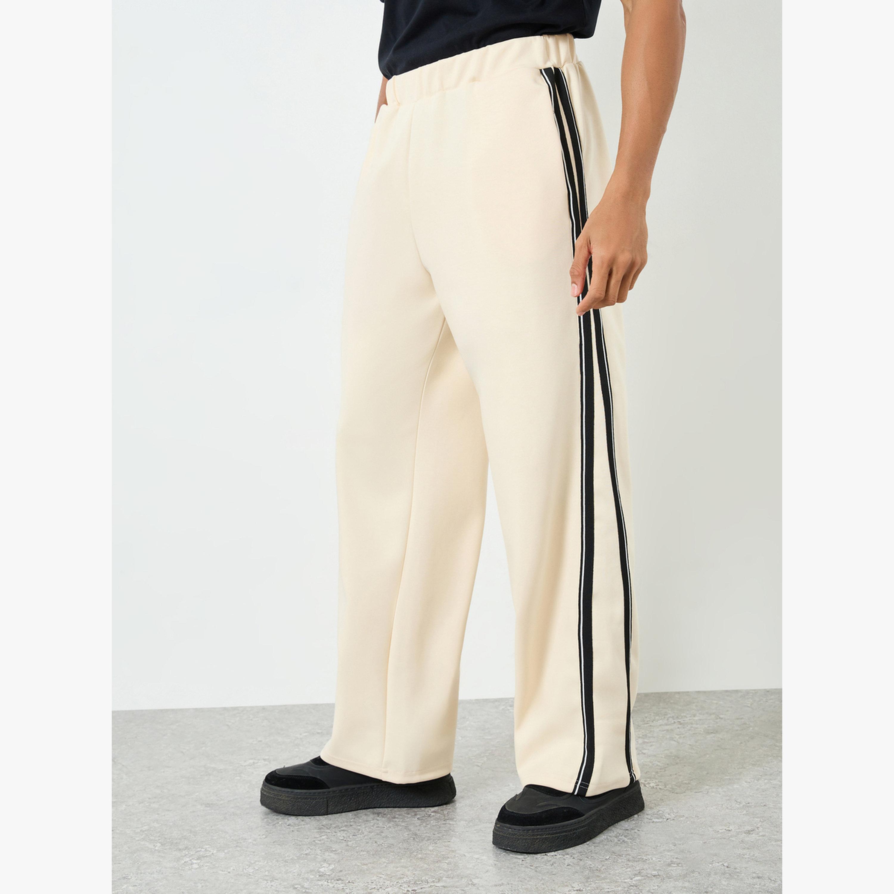 جوغر واسع مخطط بشريط جانبي-men-clothing-bottoms-joggers-image-1