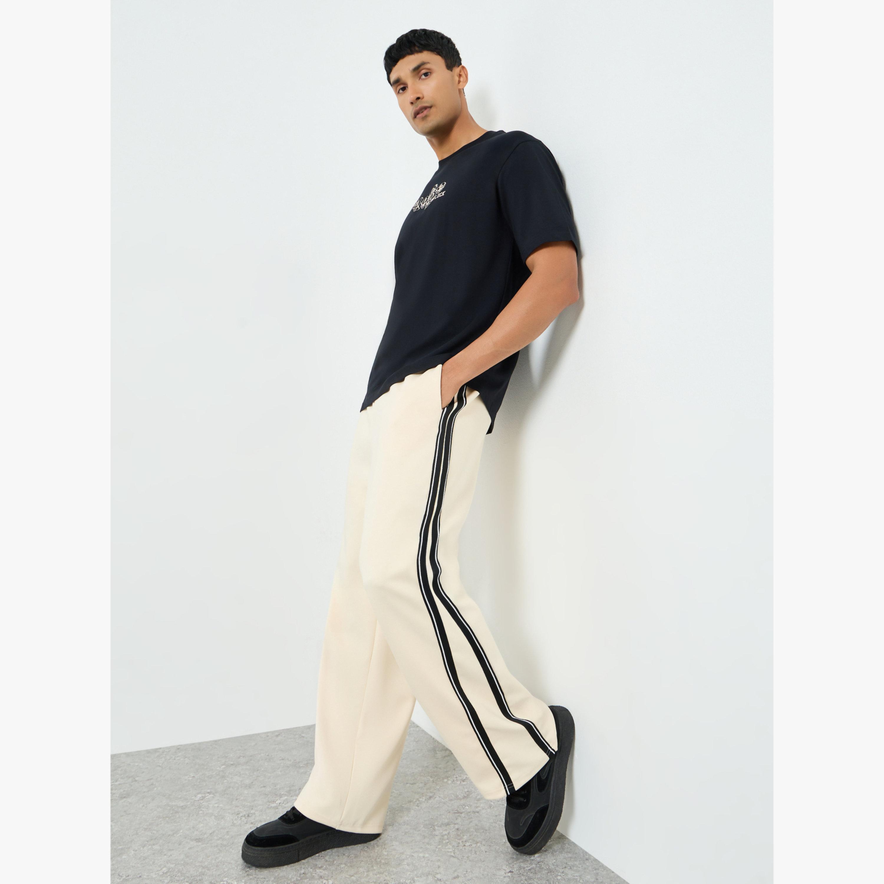 جوغر واسع مخطط بشريط جانبي-men-clothing-bottoms-joggers-image-2
