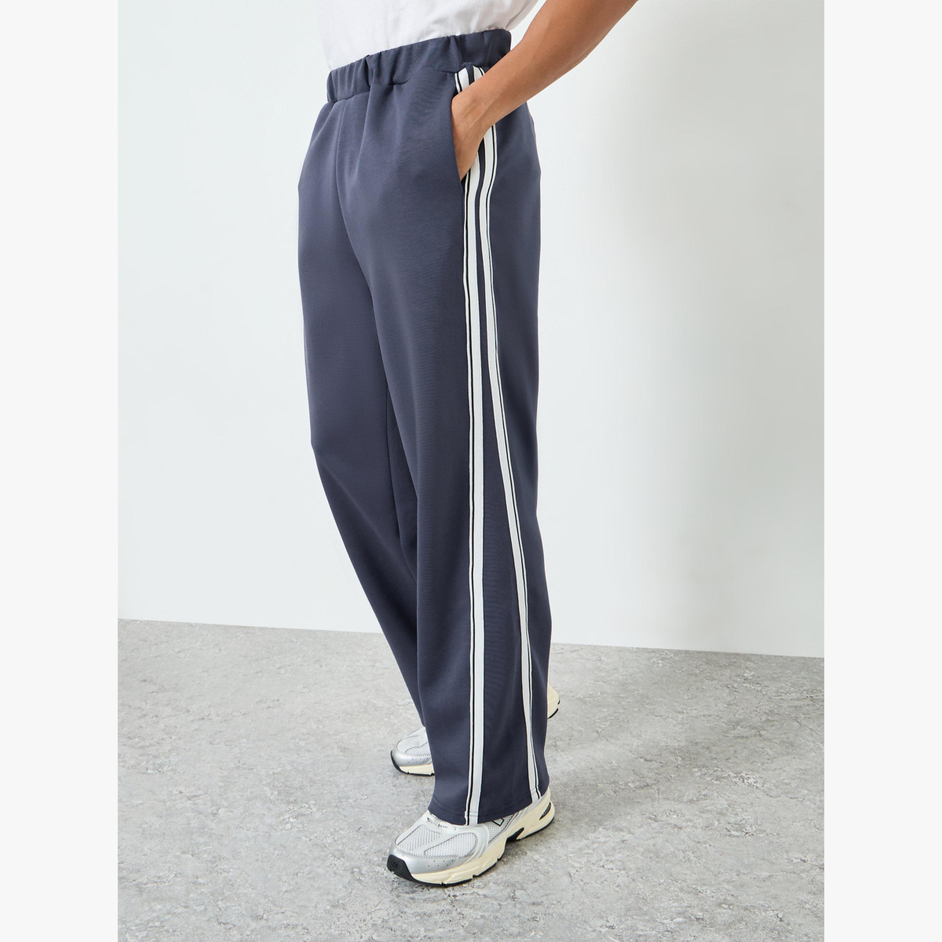 جوغر واسع ومخطط بشريط جانبي-men-clothing-bottoms-joggers-image-1
