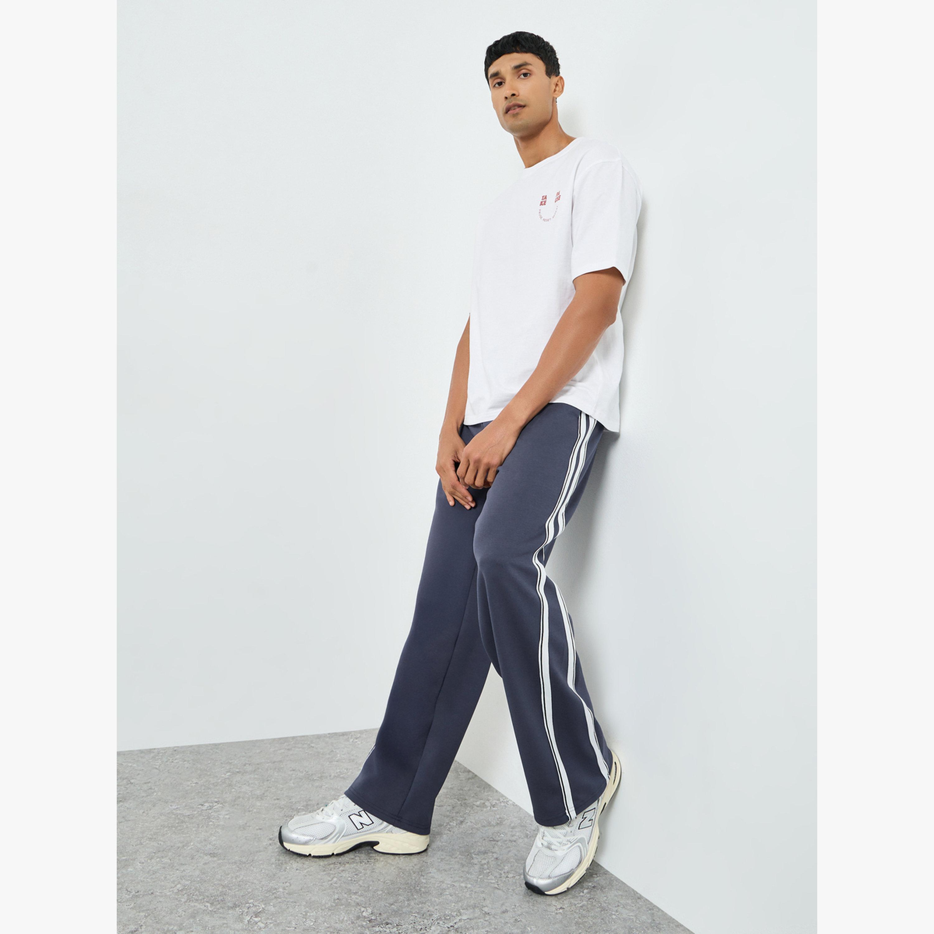 جوغر واسع ومخطط بشريط جانبي-men-clothing-bottoms-joggers-image-2