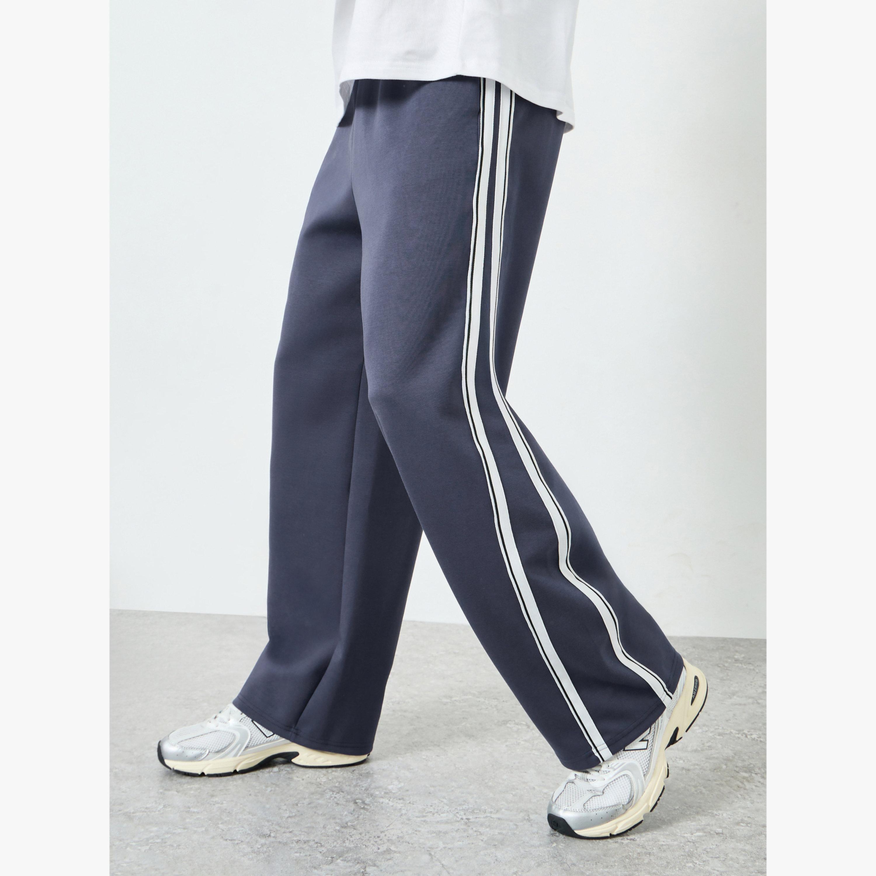 جوغر واسع ومخطط بشريط جانبي-men-clothing-bottoms-joggers-image-4