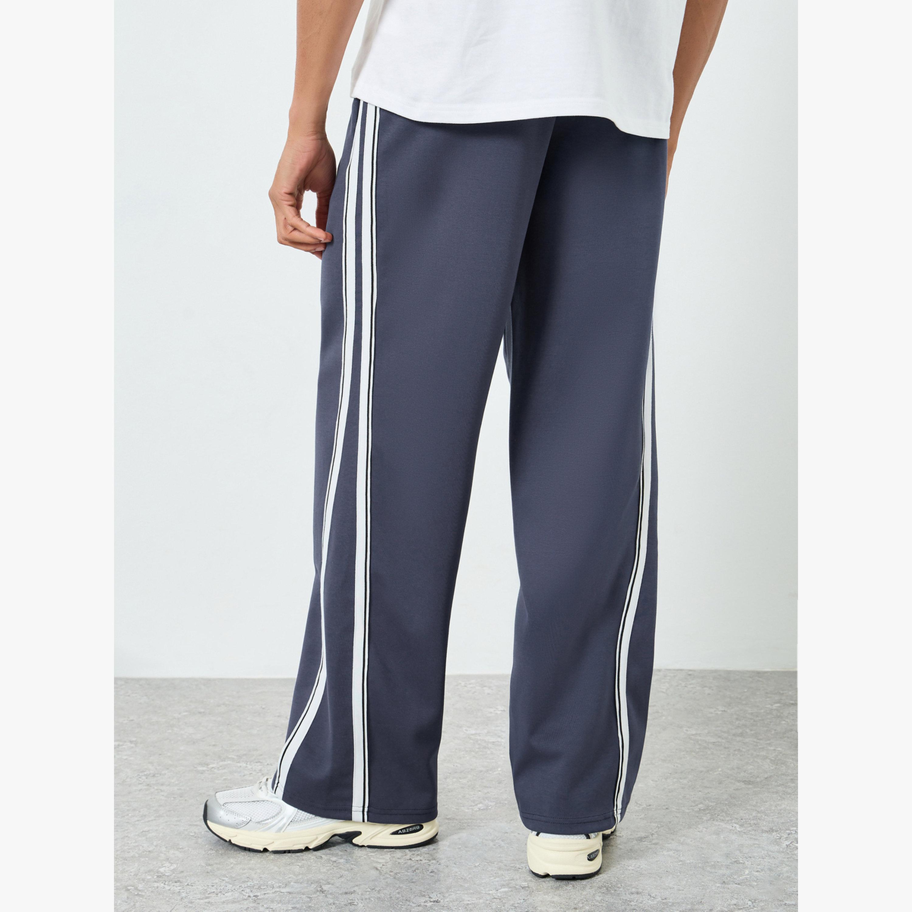 جوغر واسع ومخطط بشريط جانبي-men-clothing-bottoms-joggers-image-5