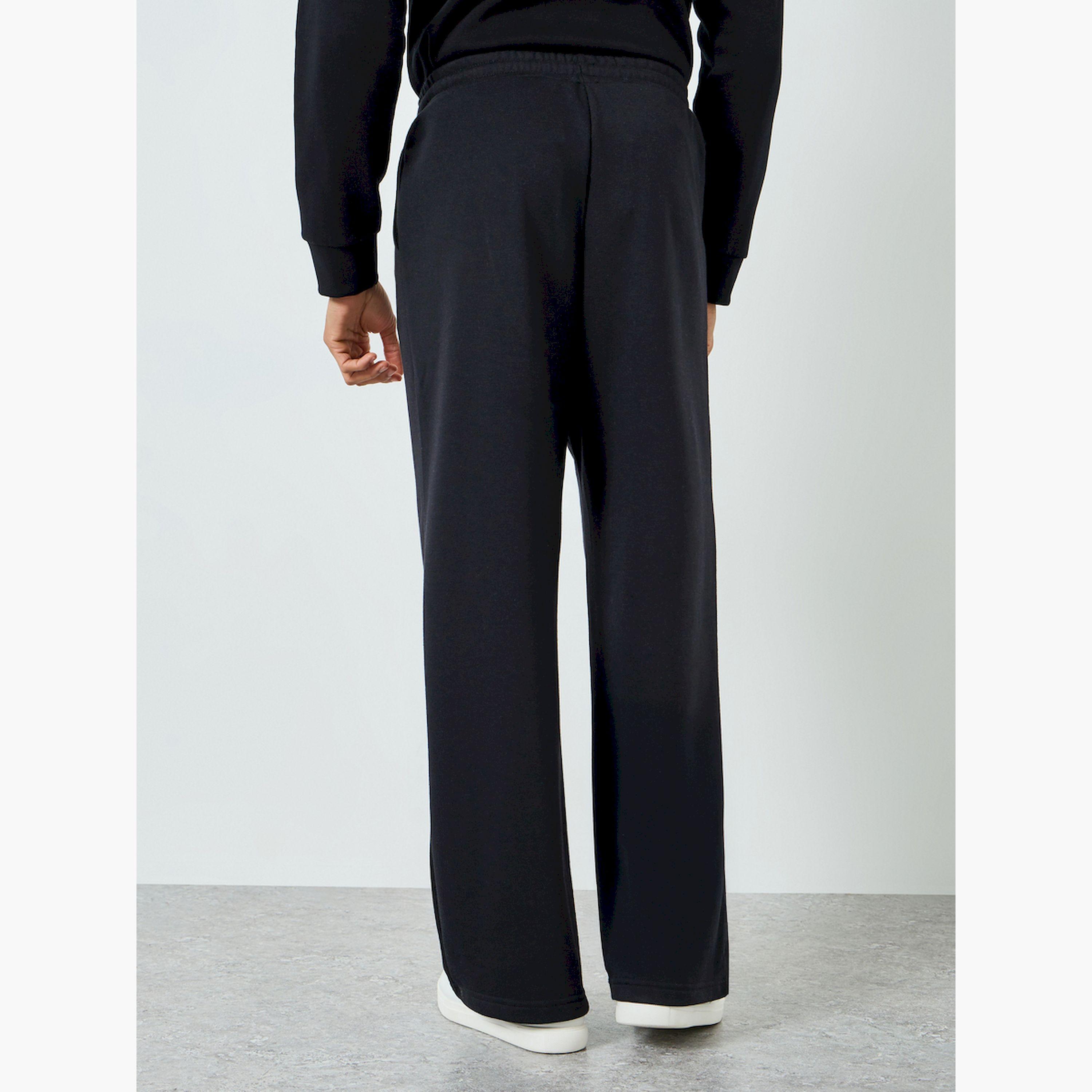 جوغر رجالي واسع بطبعة نصية-men-clothing-bottoms-joggers-image-4