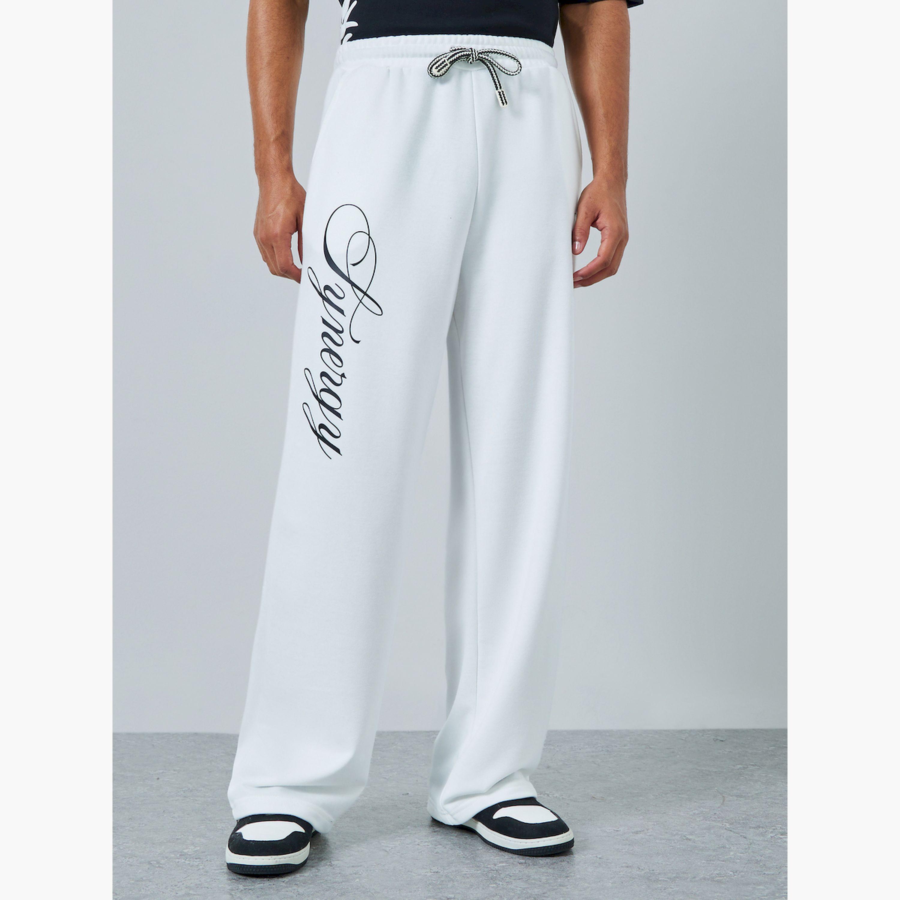 جوغر واسع بطبعة كتابة-men-clothing-bottoms-joggers-image-1