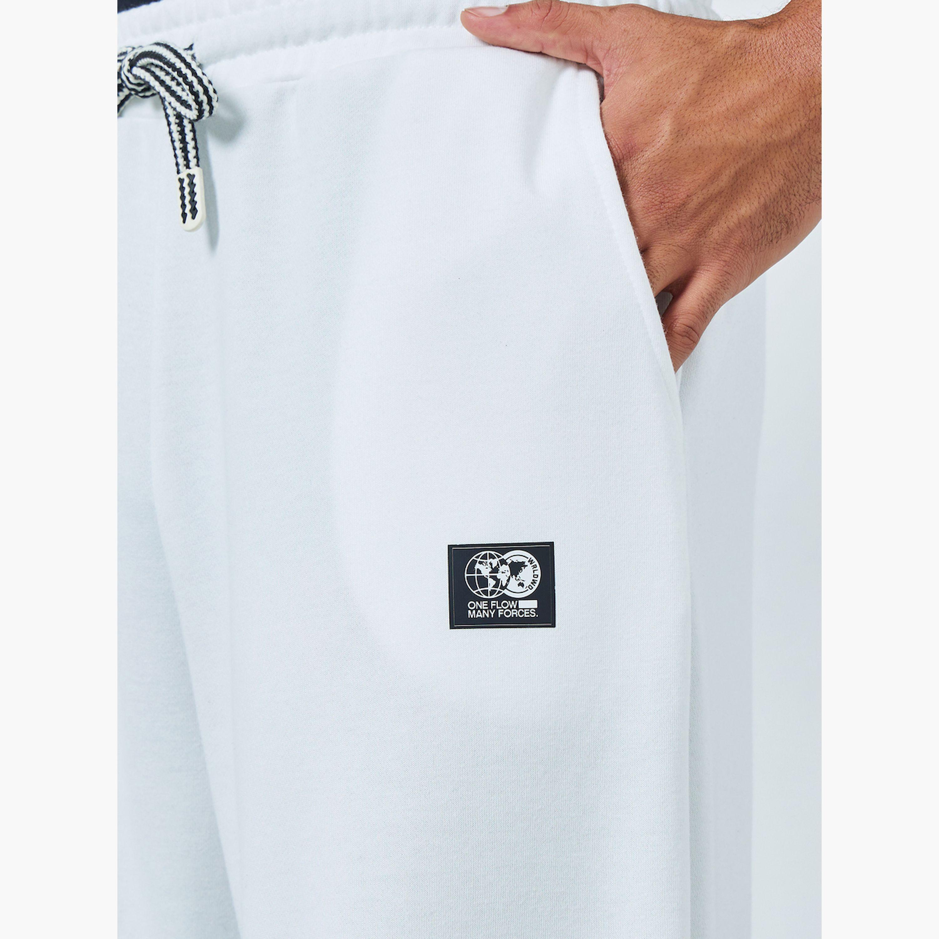جوغر واسع بطبعة كتابة-men-clothing-bottoms-joggers-image-4