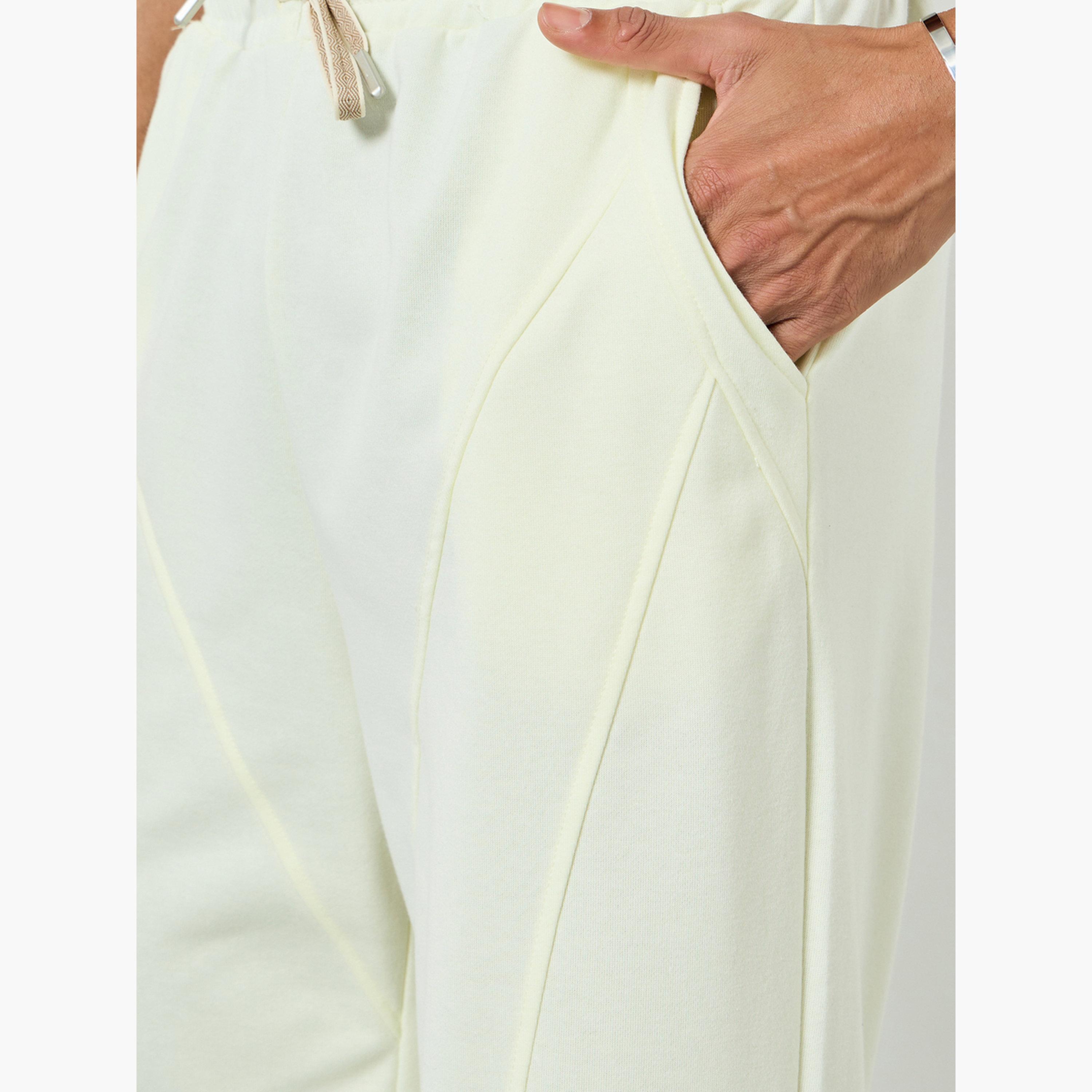 جوغر رجالي كريمي سادة بقصة مريحة-men-clothing-bottoms-joggers-image-4