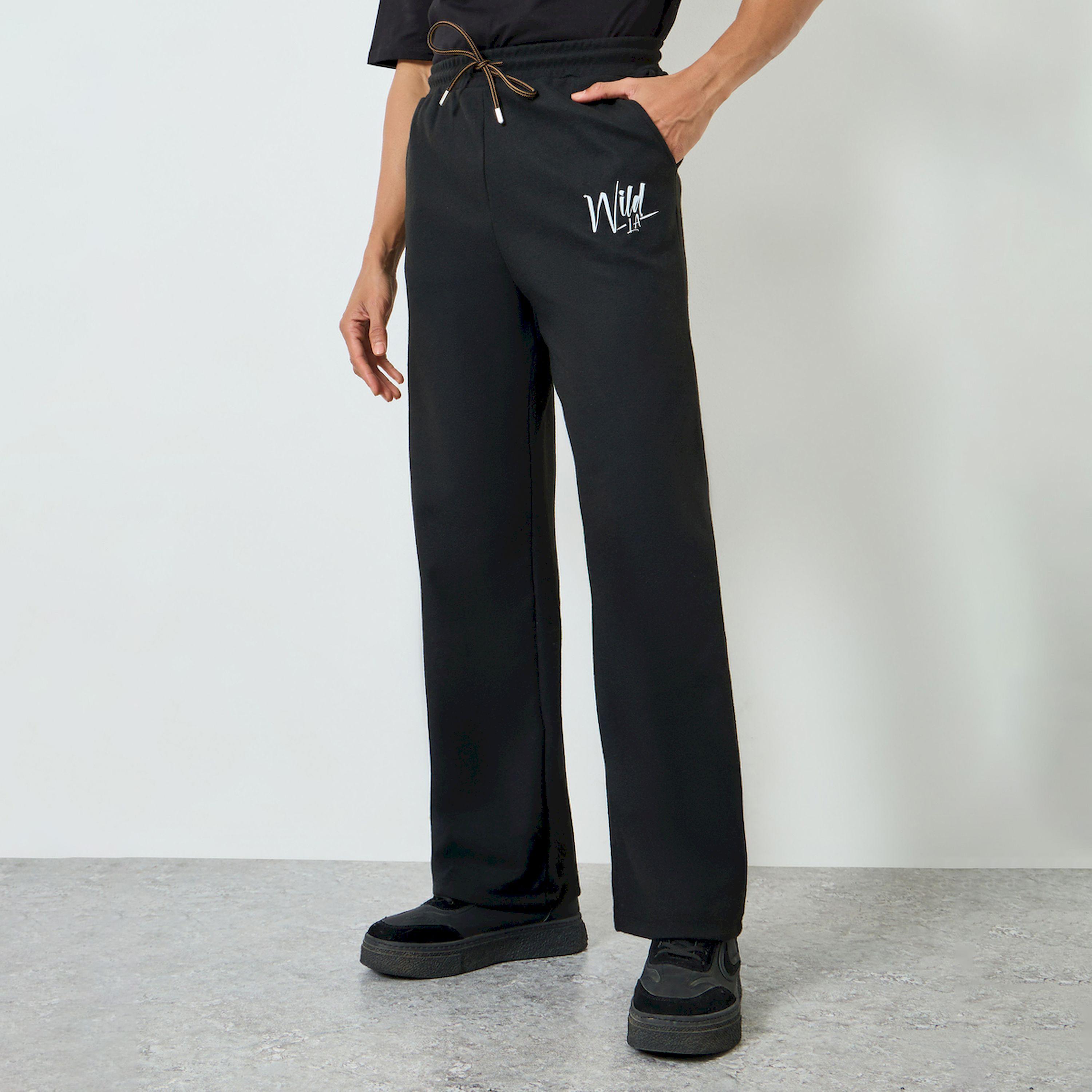 جوغر رجالي أسود مطبوع واسع-men-clothing-bottoms-joggers-image-1