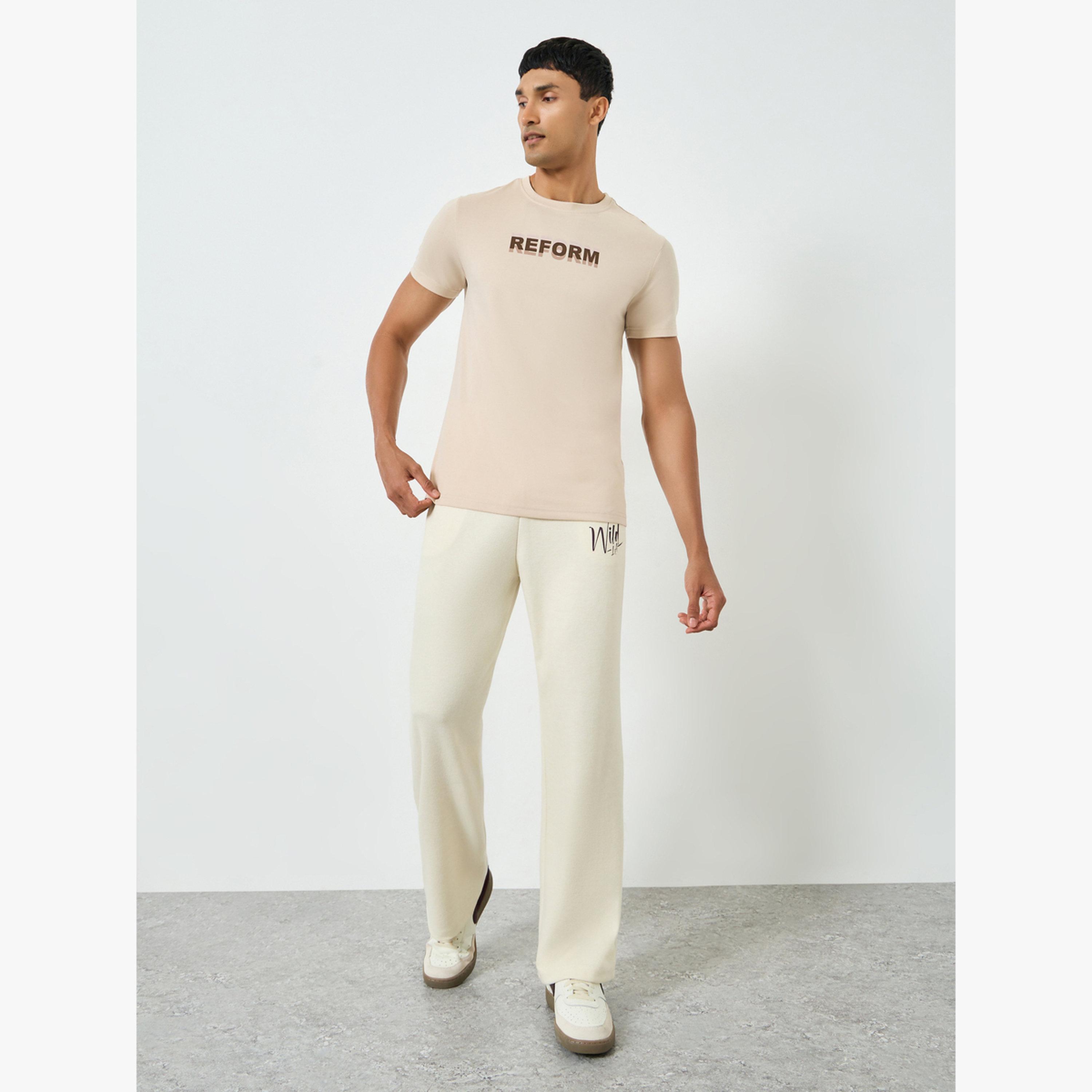 Styli Men Cream Text Print Oversized Joggers-men-clothing-bottoms-joggers-image-2