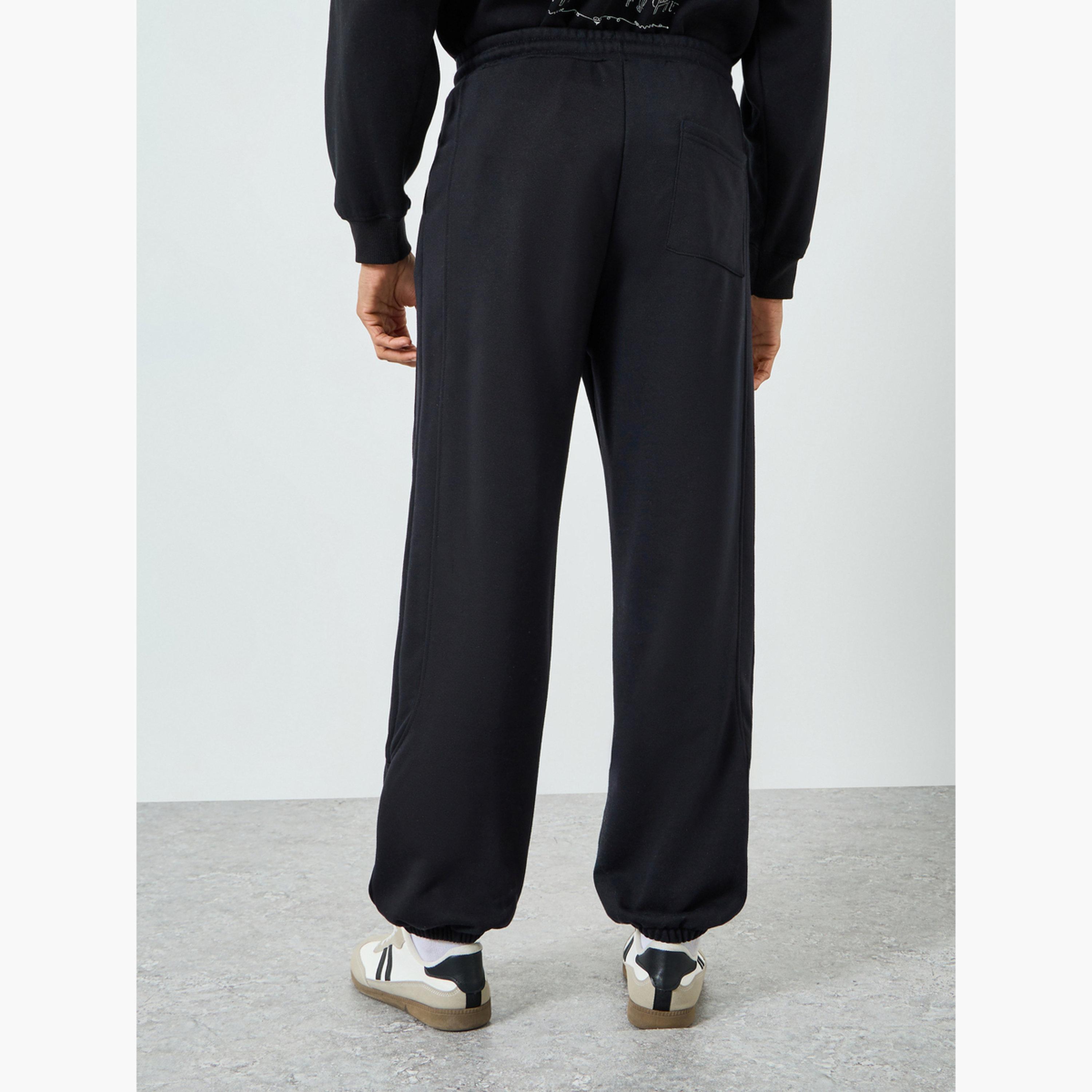Styli Men Black Elastic Hem Relaxed Badge Joggers-men-clothing-bottoms-joggers-image-3