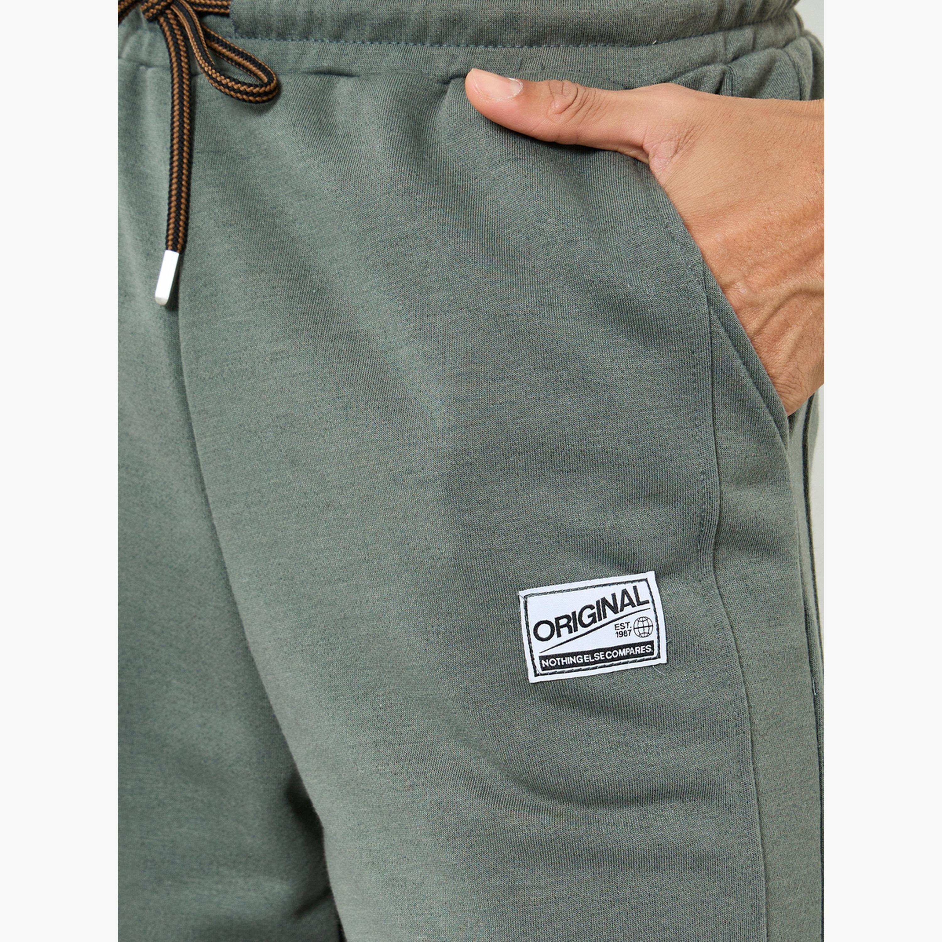 بنطال جوغر بقصة مريحة-men-clothing-bottoms-joggers-image-4