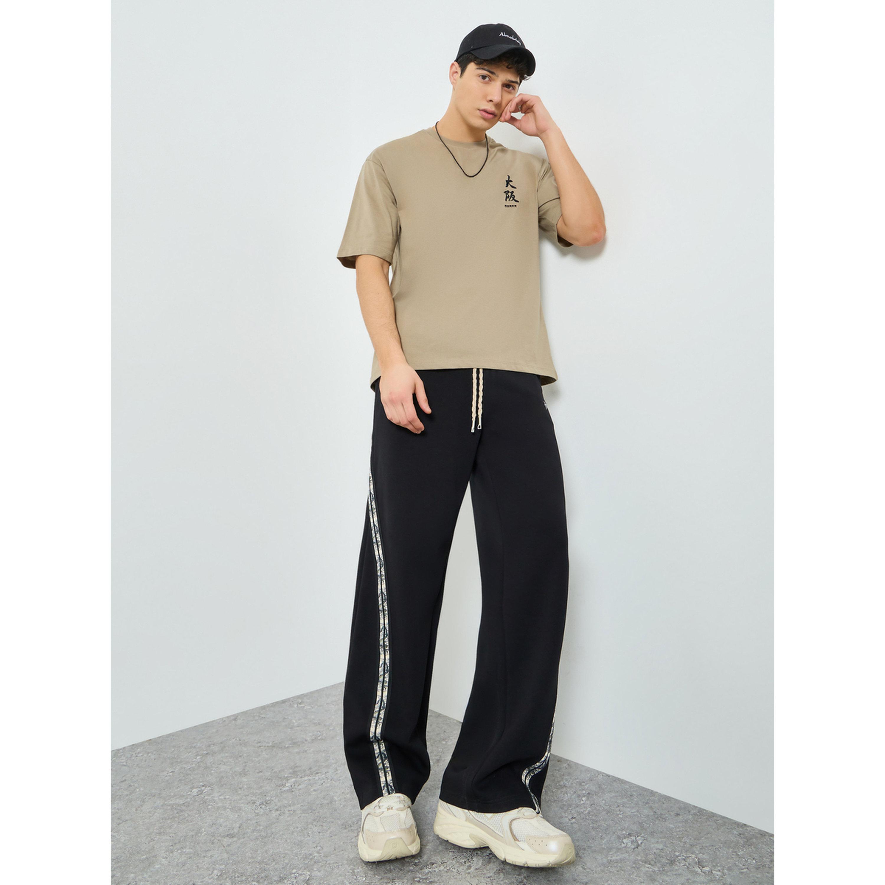 Styli Men Black Side Taping Print Oversized Joggers-men-clothing-bottoms-joggers-image-2