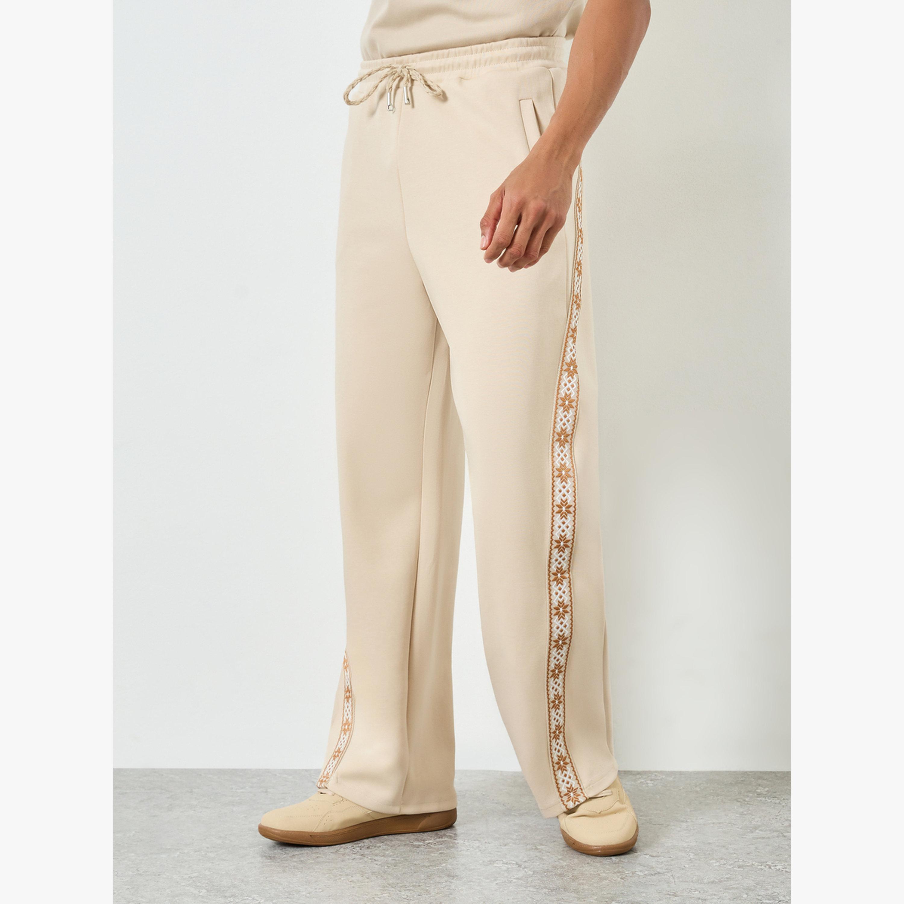 Styli Men Beige Side Taping Print Oversized Joggers-men-clothing-bottoms-joggers-image-1