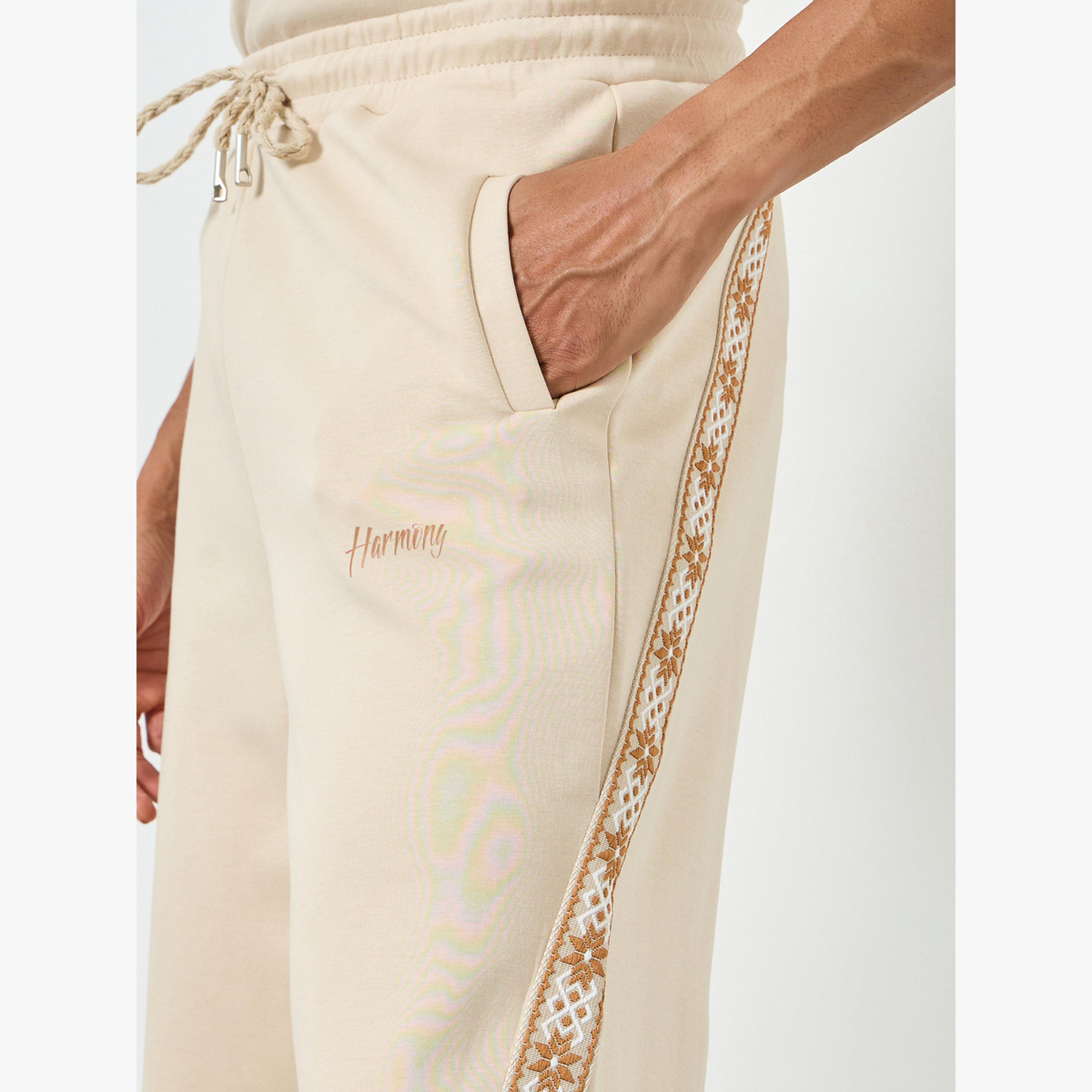 جوغر واسع بطبعة وشريط جانبي-men-clothing-bottoms-joggers-image-4