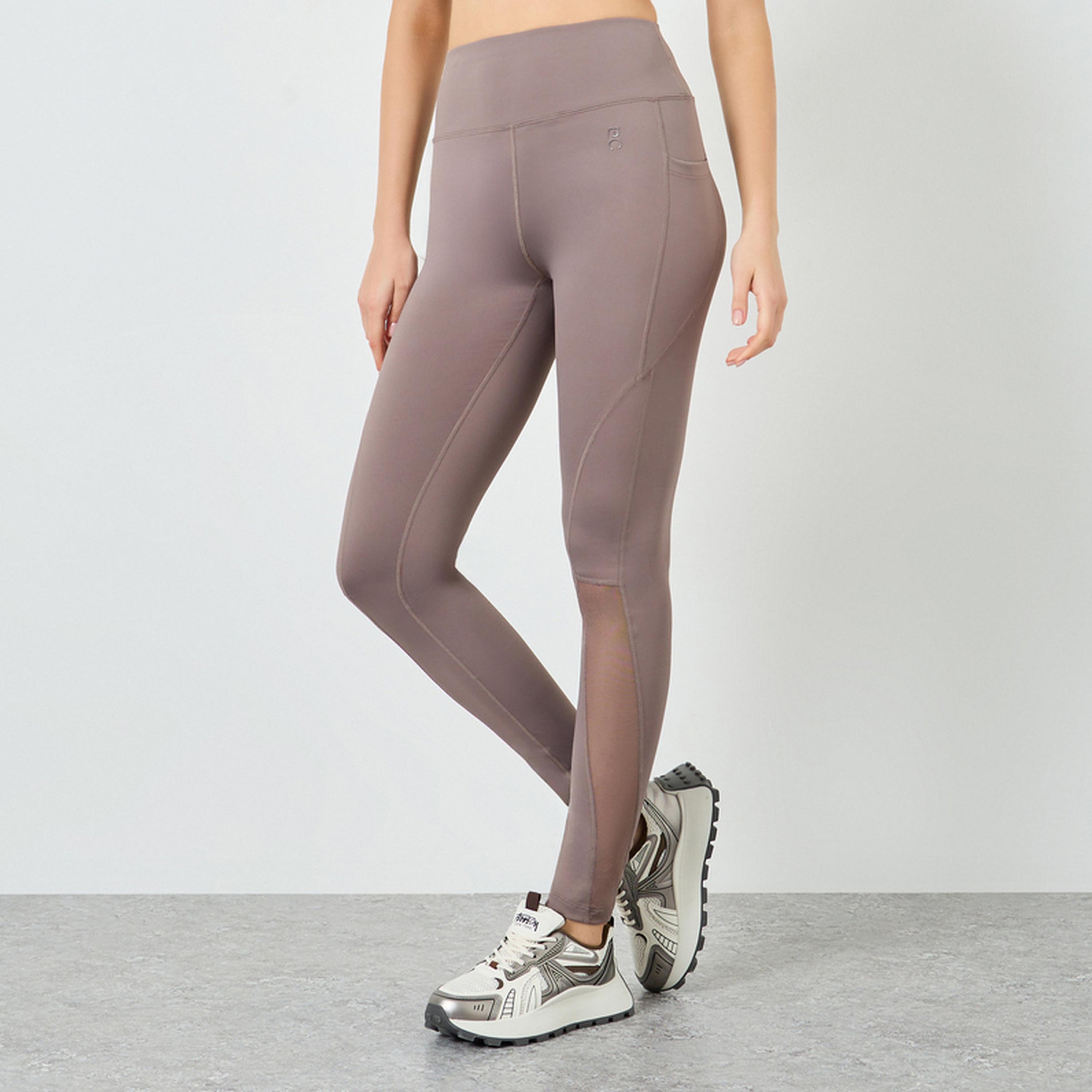 ليقنز بطول 7/8 مع تفاصيل شبكية وشعار مطاطي-sports-women-clothing-joggersandtrackpants-image-1