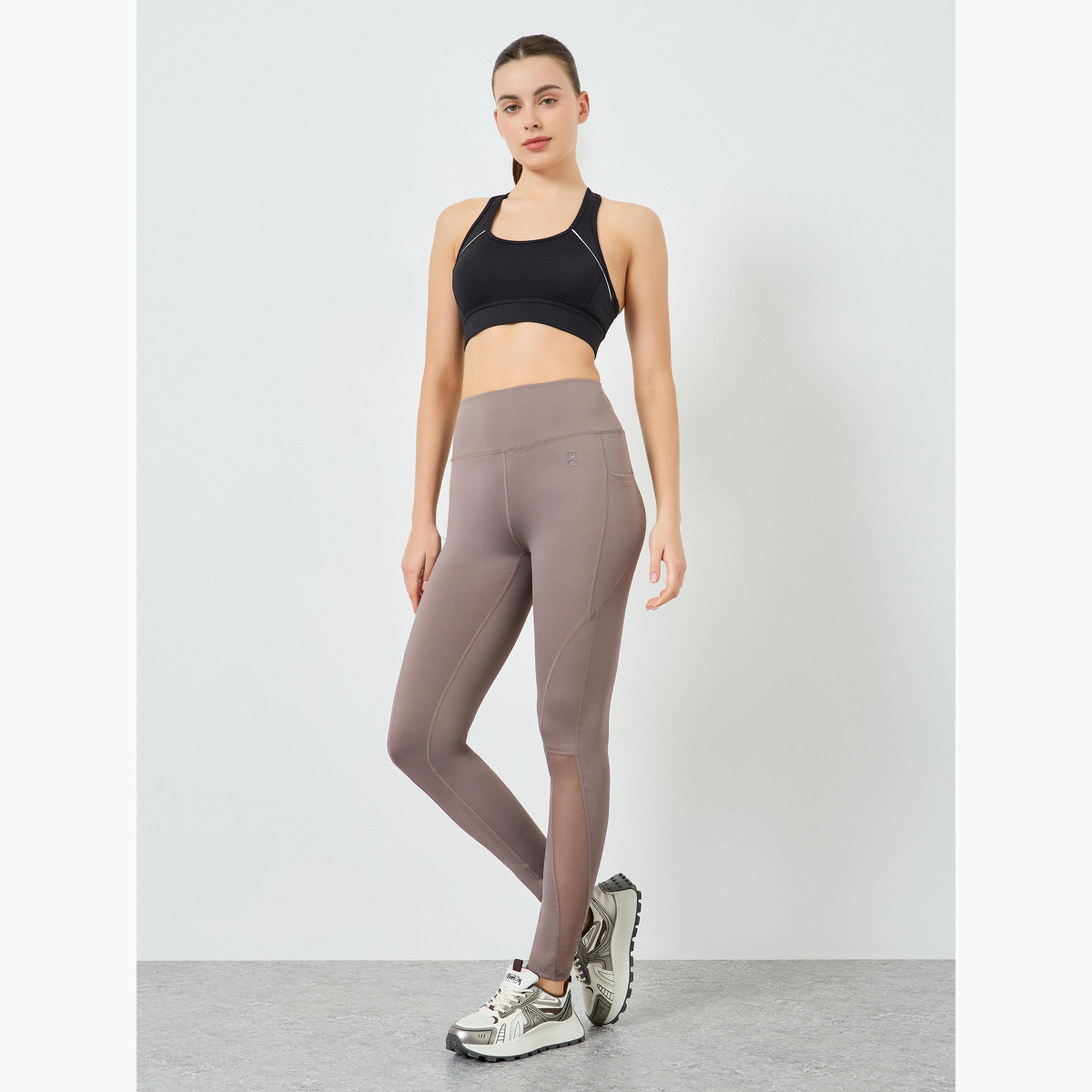 ليقنز بطول 7/8 مع تفاصيل شبكية وشعار مطاطي-sports-women-clothing-joggersandtrackpants-image-2
