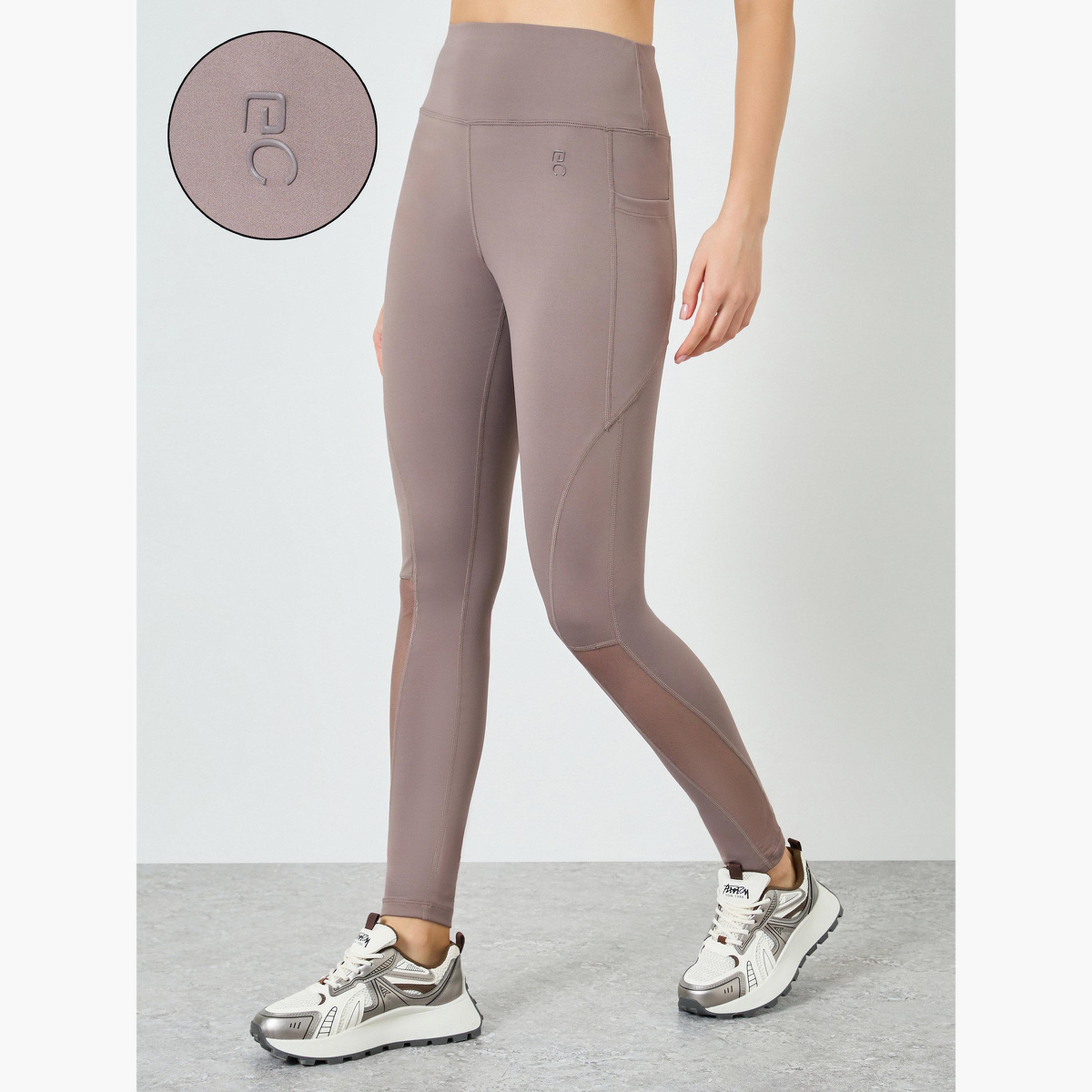 ليقنز بطول 7/8 مع تفاصيل شبكية وشعار مطاطي-sports-women-clothing-joggersandtrackpants-image-3