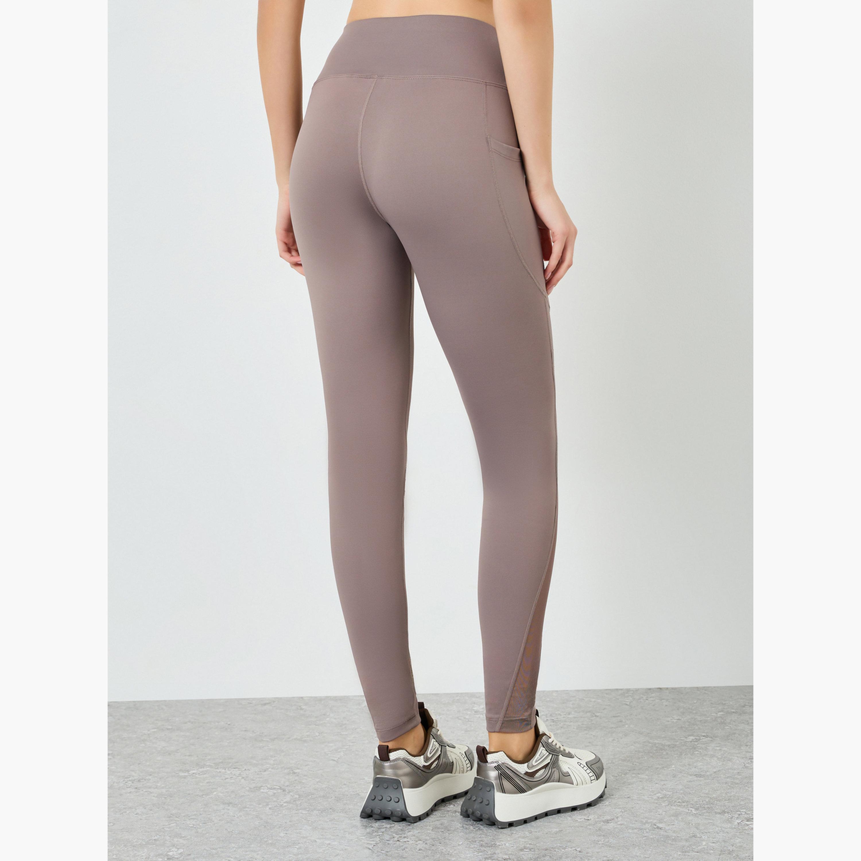 ليقنز بطول 7/8 مع تفاصيل شبكية وشعار مطاطي-sports-women-clothing-joggersandtrackpants-image-4