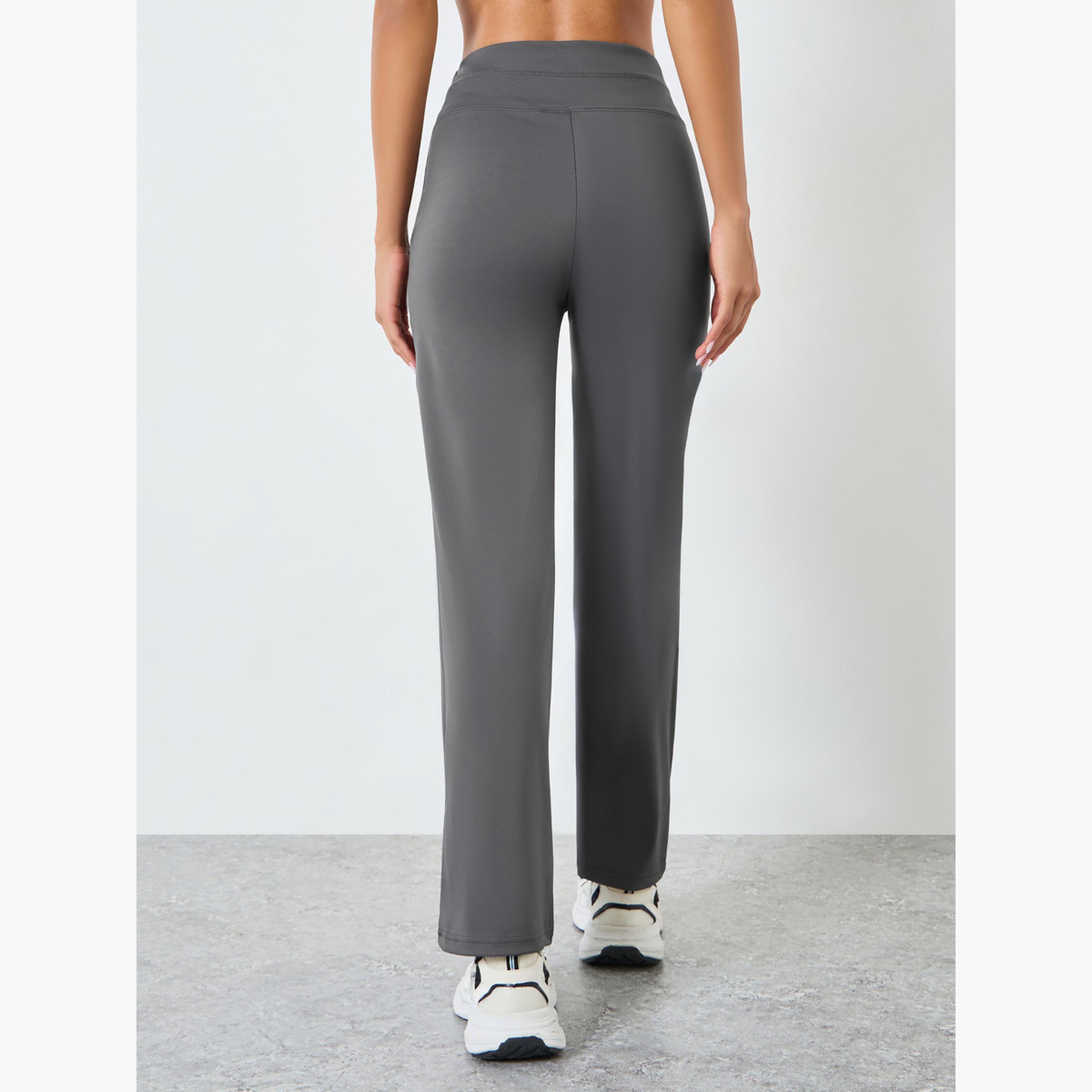 ليقنز بأرجل مستقيمة وشعار مطاطي-sports-women-clothing-joggersandtrackpants-image-4