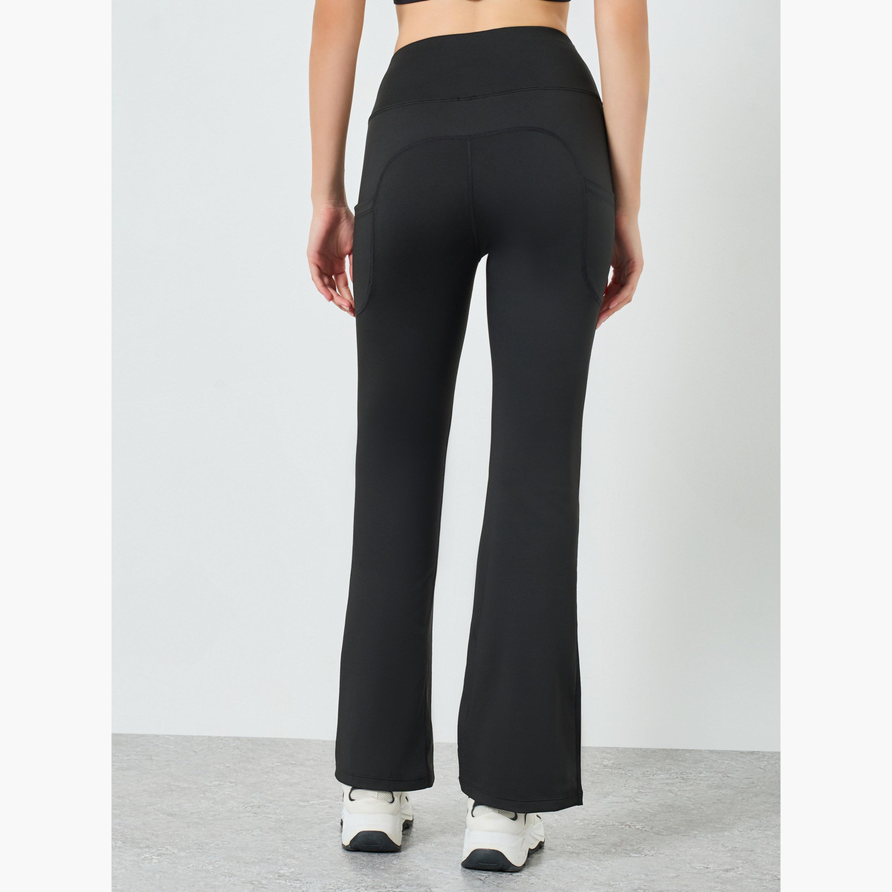 ليقنز واسع بشعار مطاطي وشريط عاكس-sports-women-clothing-joggersandtrackpants-image-3